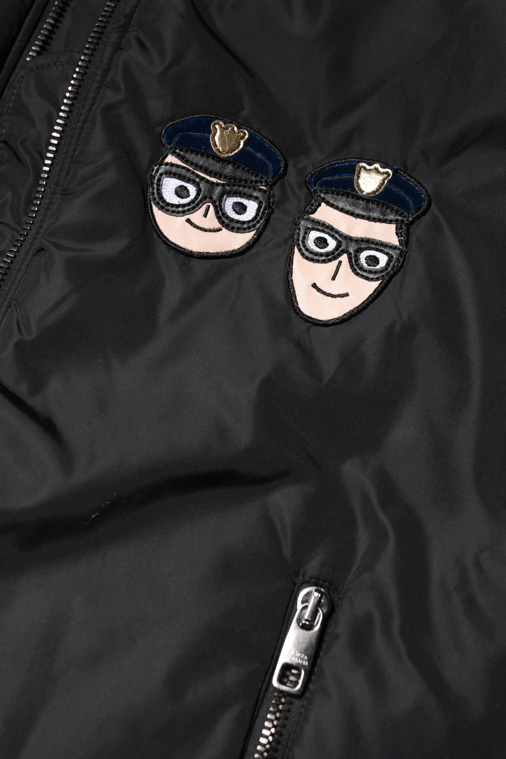 Discover the Dolce & Gabbana Black Nylon #DGFamily Full Zip Bomber Jacket, a masterpiece of Italian craftsmanship that elevates your style with luxurious elegance and versatility.