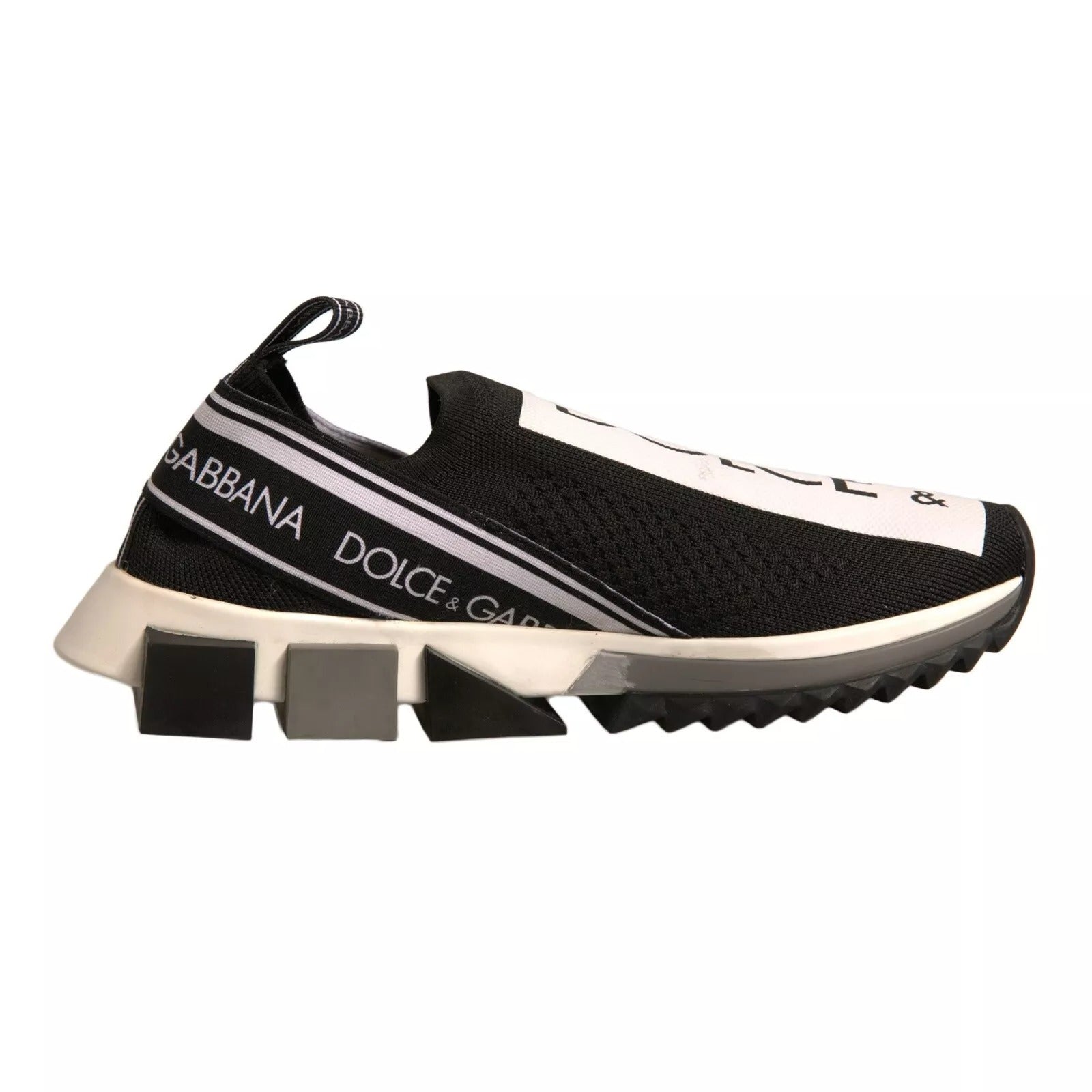 Experience the allure of Dolce & Gabbana's Black White Slip On Sorrento Sneakers, crafted from luxurious stretch mesh, embodying timeless elegance and Italian artistry.