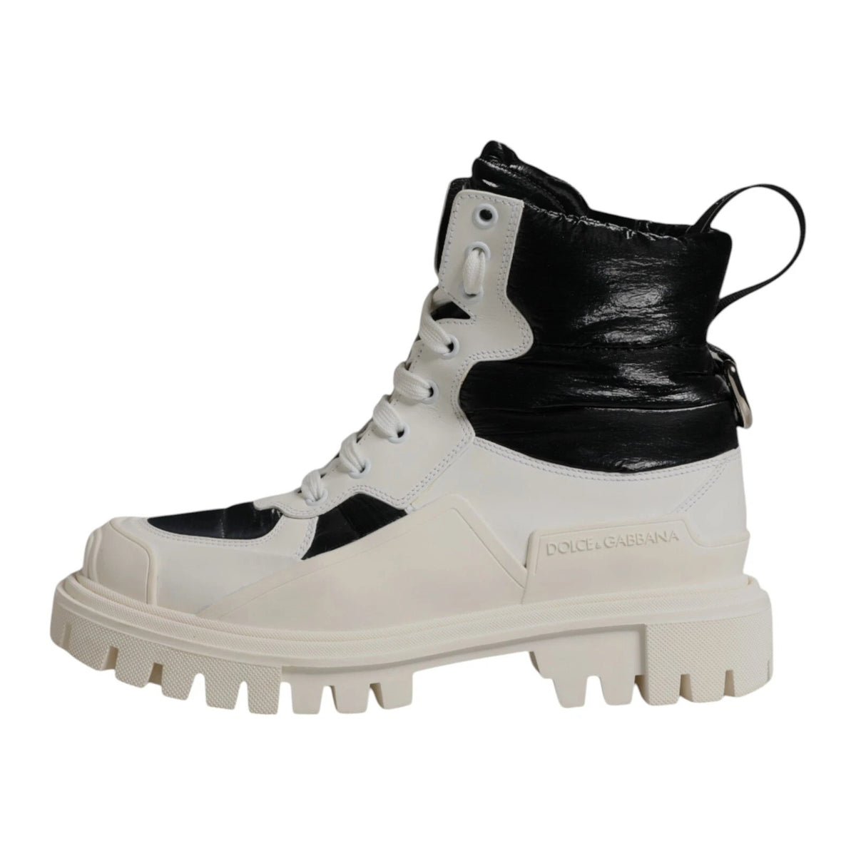 Experience the allure of Dolce & Gabbana's White Padded Mid Calf Lace Up Boots, where exquisite Italian craftsmanship meets luxurious design for the discerning connoisseur.