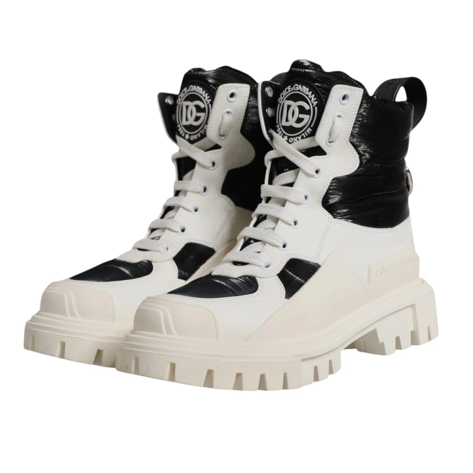 Elevate your style with Dolce & Gabbana's White Padded Mid Calf Lace Up Boots, a luxurious blend of premium materials and exquisite Italian craftsmanship for the discerning fashion connoisseur.