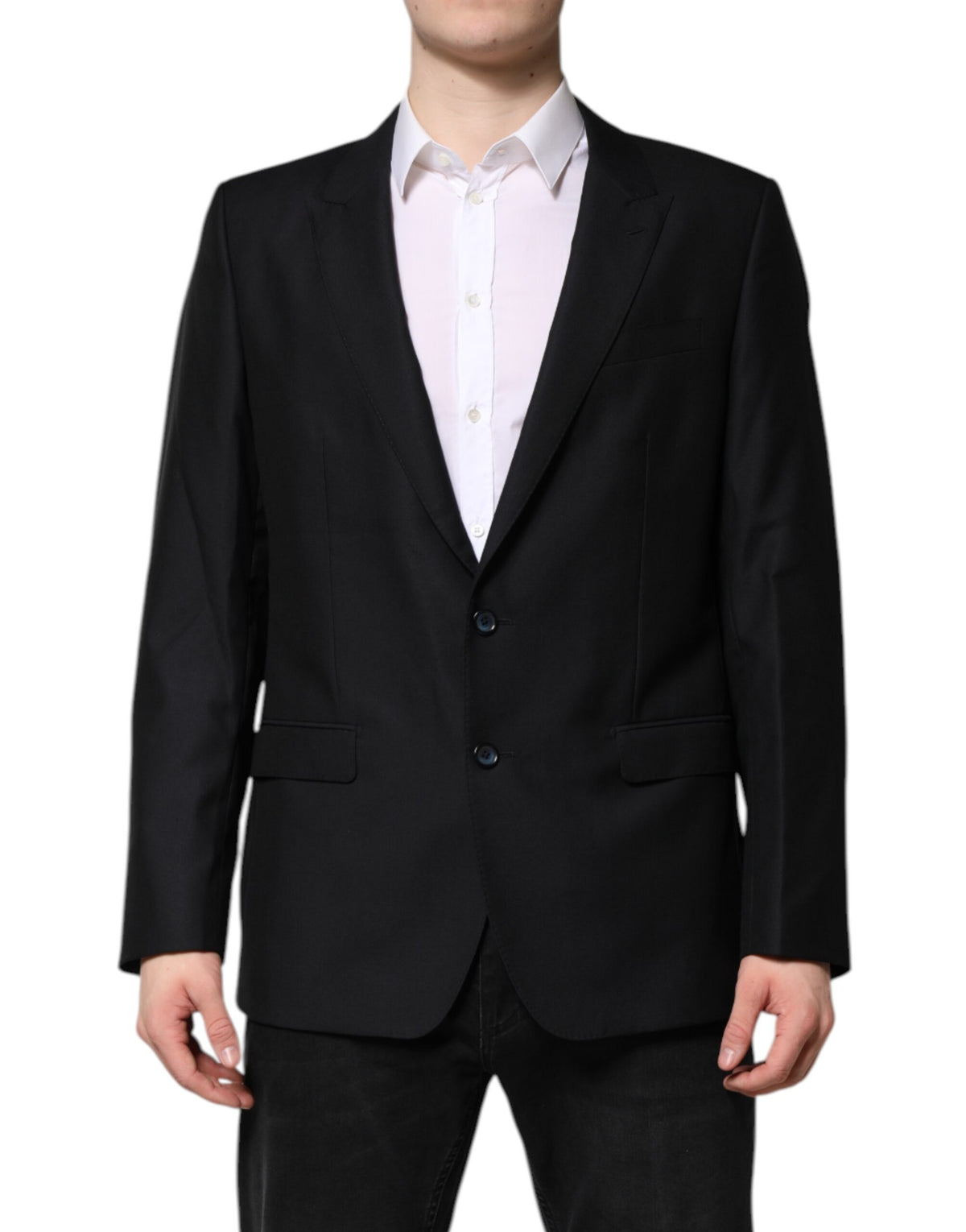 Experience the exquisite Dolce & Gabbana Dark Blue MARTINI Wool Blazer, a masterpiece of Italian craftsmanship, blending luxurious virgin wool and silk for timeless elegance.
