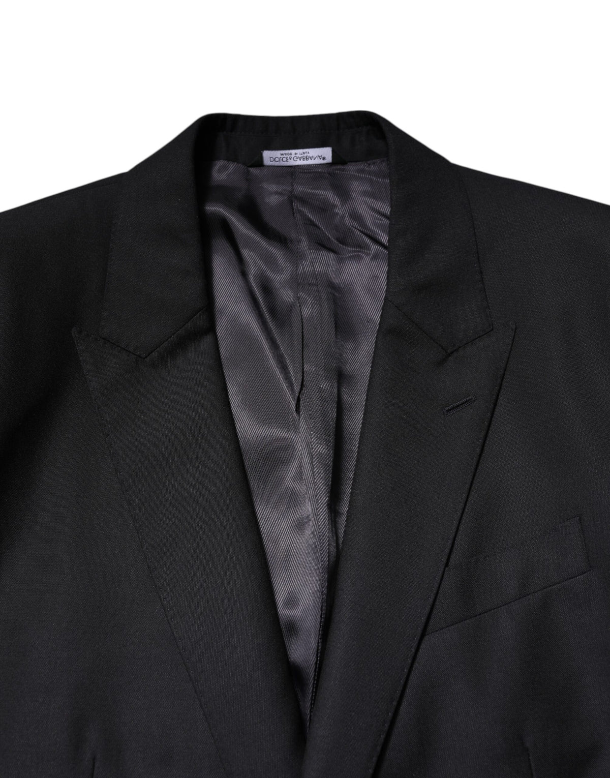 Experience the exquisite Dolce & Gabbana Dark Blue MARTINI Wool Blazer, a masterpiece of Italian craftsmanship blending luxury virgin wool and silk for timeless elegance.