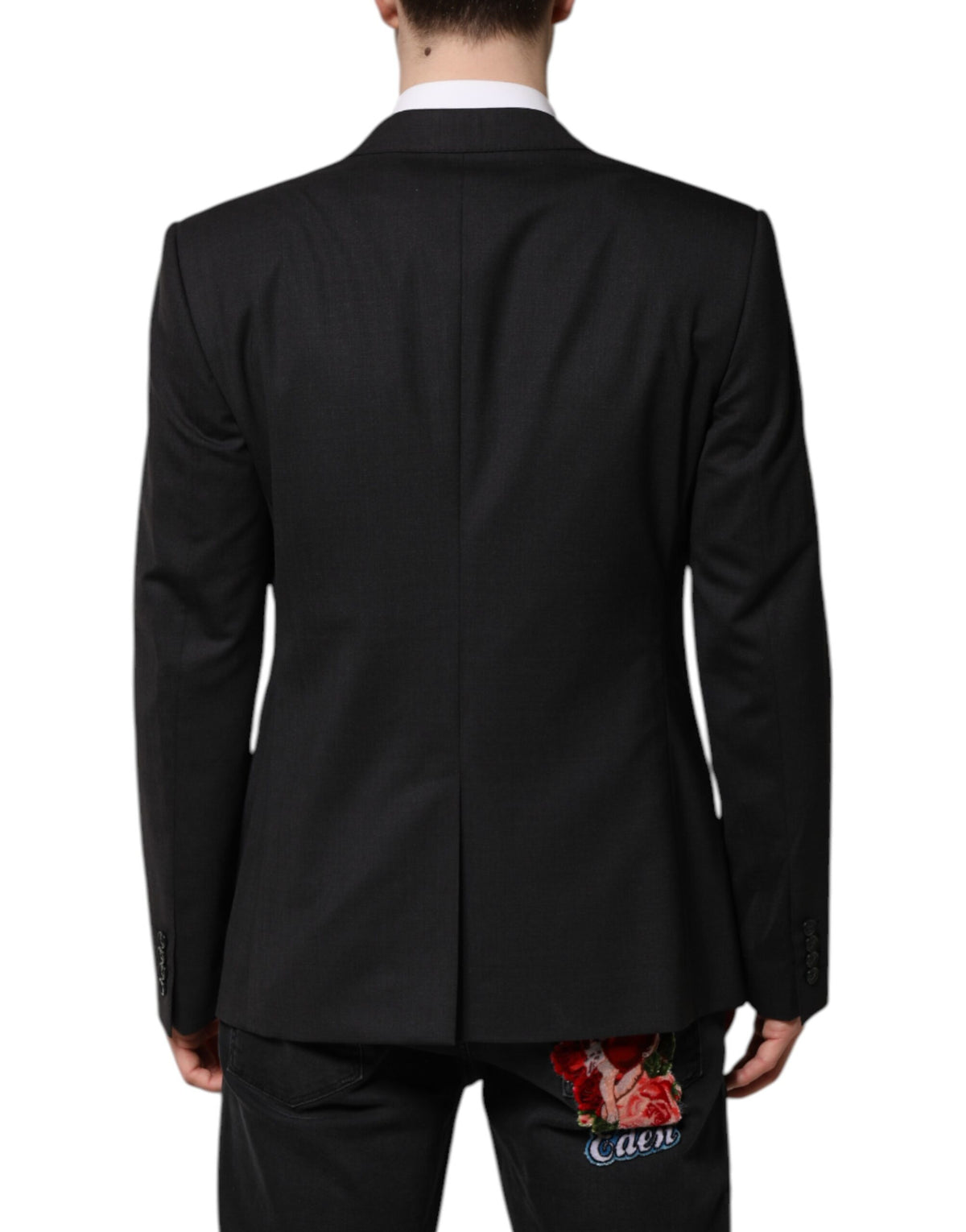 Elevate your wardrobe with the Dolce & Gabbana Dark Gray MARTINI Single Breasted Jacket, a masterpiece of luxurious virgin wool and exquisite Italian craftsmanship.