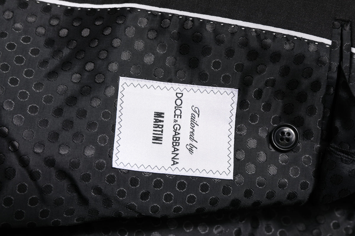 Experience the epitome of sophistication with the Dolce & Gabbana Dark Gray MARTINI Single Breasted Jacket, crafted from luxurious virgin wool for timeless elegance.