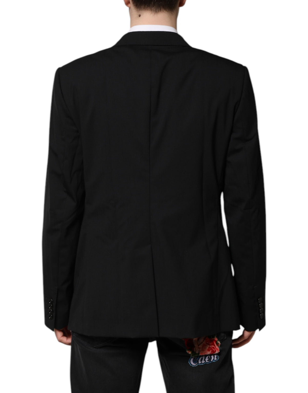 Discover the Dolce & Gabbana Black MARTINI Double Breasted Suit Jacket, a masterpiece of Italian craftsmanship in luxurious virgin wool and silk, designed for timeless elegance.