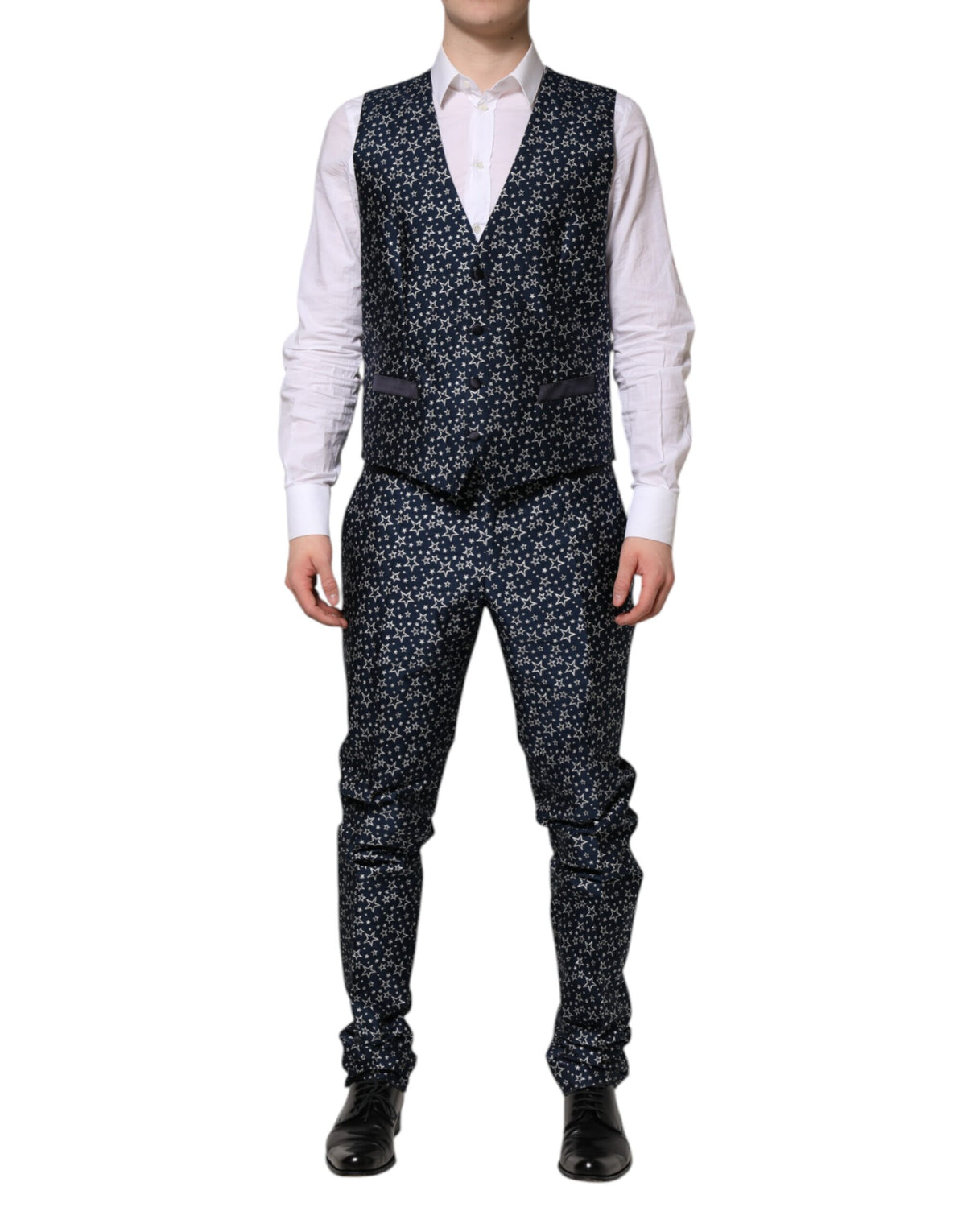 Discover the Dolce & Gabbana Blue MARTINI Star Jacquard 3 Piece Suit, a masterpiece of Italian craftsmanship that embodies elegance and sophistication for the discerning individual.