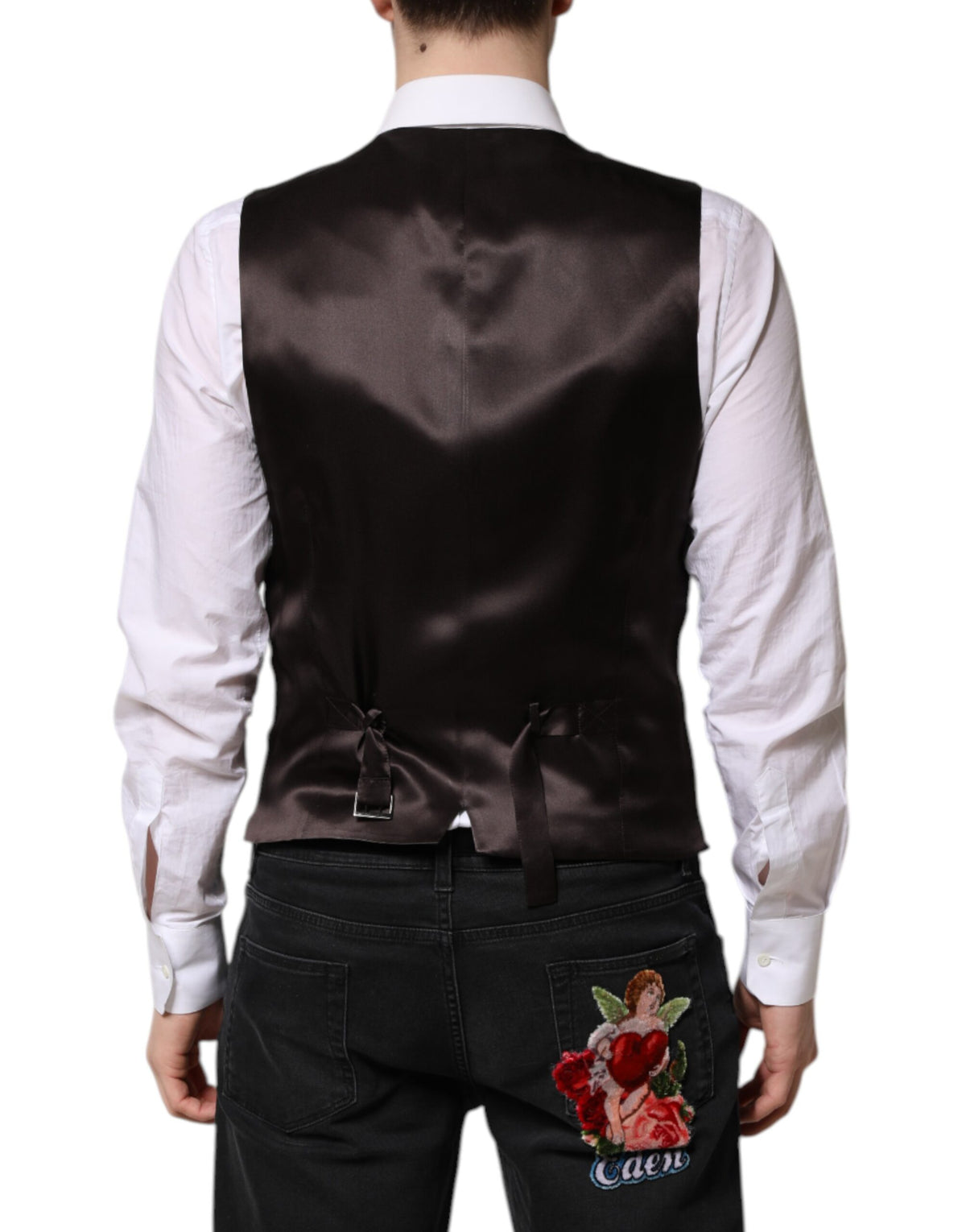 Indulge in the exquisite Dolce & Gabbana Black Stripes Wool Formal Waistcoat, a masterpiece of 100% virgin wool and silk, embodying timeless elegance and refined sophistication.