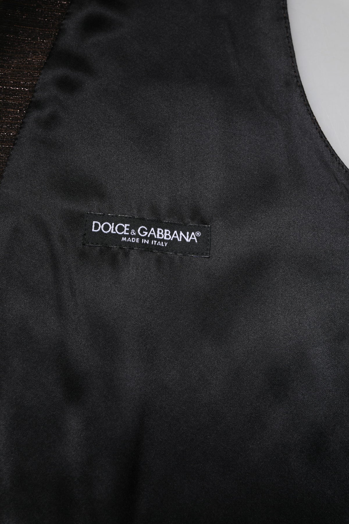 Elevate your style with the Dolce & Gabbana Dark Brown Dress Waistcoat Vest, a masterpiece of Italian craftsmanship in luxurious silk and acetate, perfect for any refined occasion.
