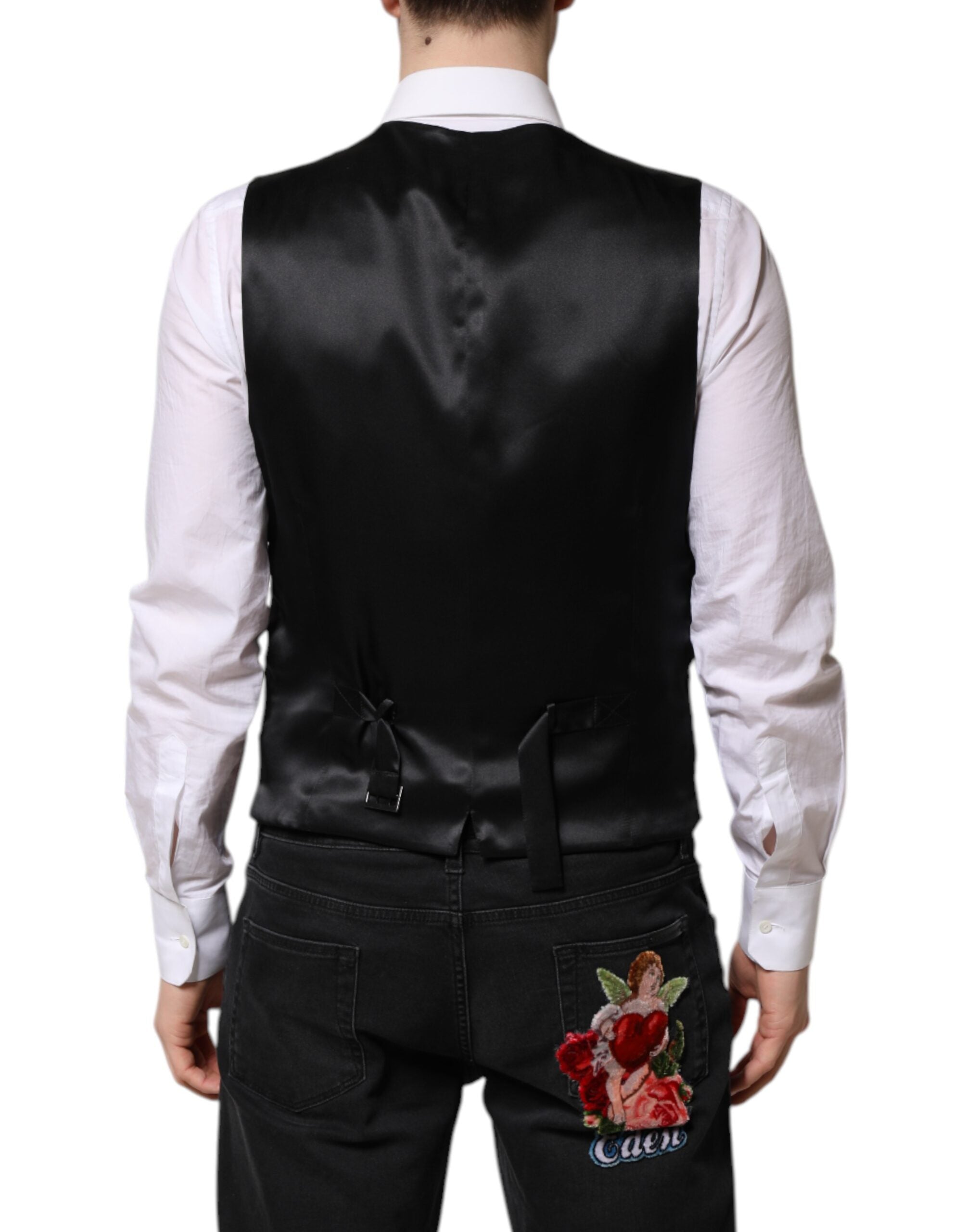 Indulge in the exquisite Dolce & Gabbana Pink Floral Satin Waistcoat Vest, a testament to Italian craftsmanship, blending luxurious silk and polyester for an elevated, sophisticated style.