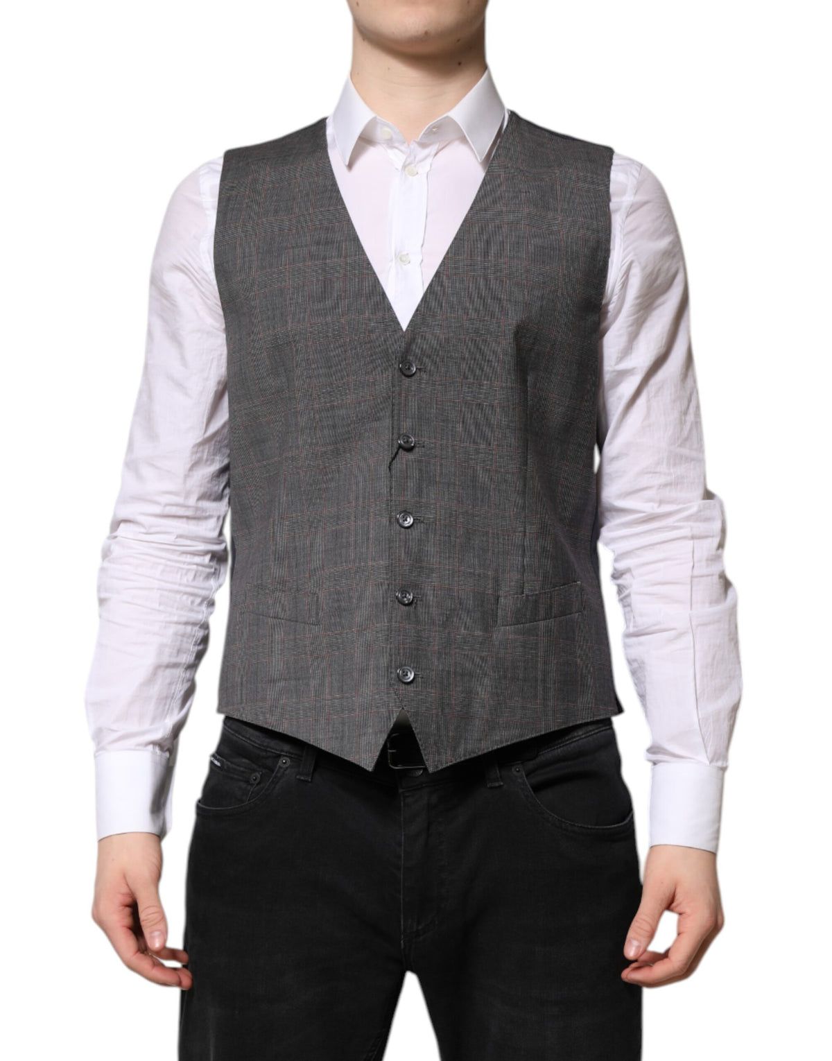 Elevate your wardrobe with the Dolce & Gabbana Gray Plaid Wool Formal Dress Waistcoat, a masterpiece of artisanal elegance crafted from 100% virgin wool and silk.