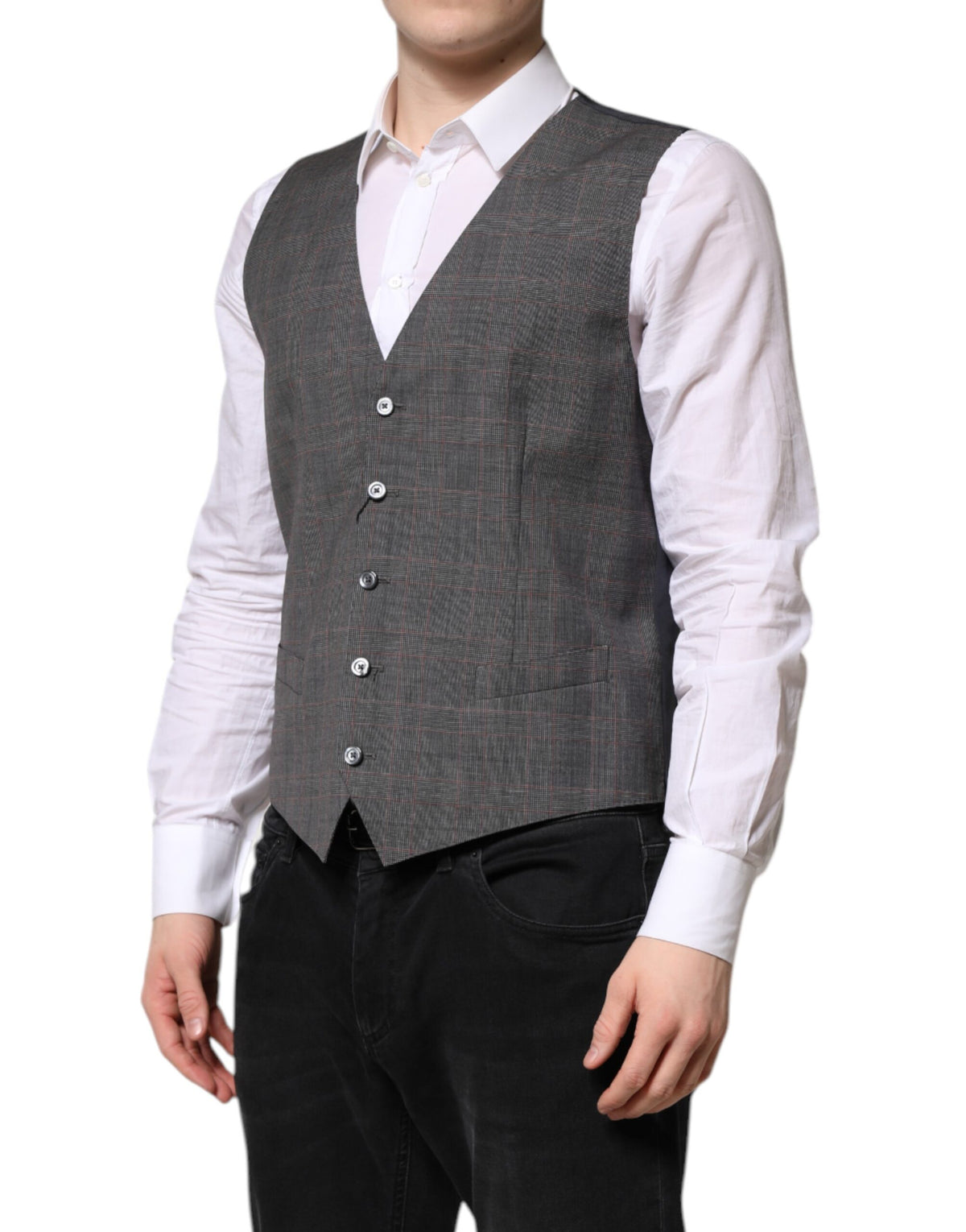 Elevate your elegance with the Dolce & Gabbana Gray Plaid Wool Waistcoat, crafted from 100% virgin wool and silk lining, embodying timeless sophistication for the discerning individual.