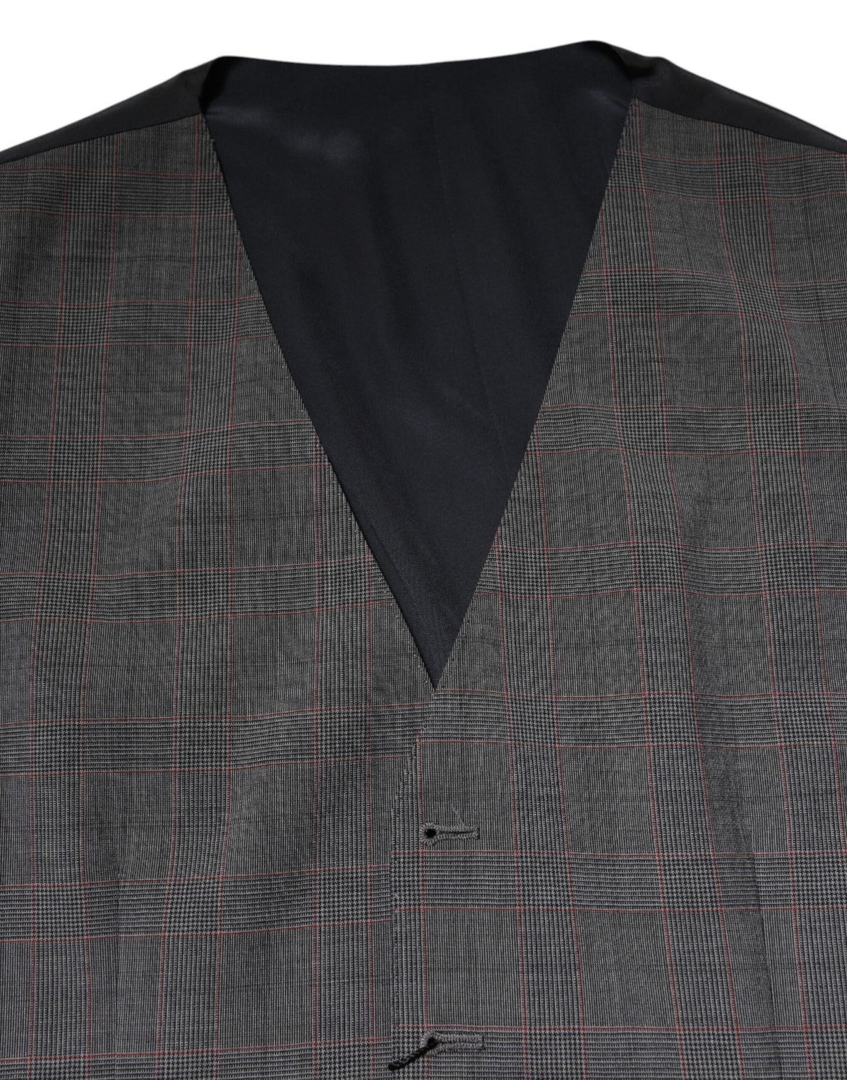 Elevate your wardrobe with the Dolce & Gabbana Gray Plaid Wool Formal Dress Waistcoat Vest, a masterpiece of 100% virgin wool and silk, embodying timeless elegance and artisanal excellence.