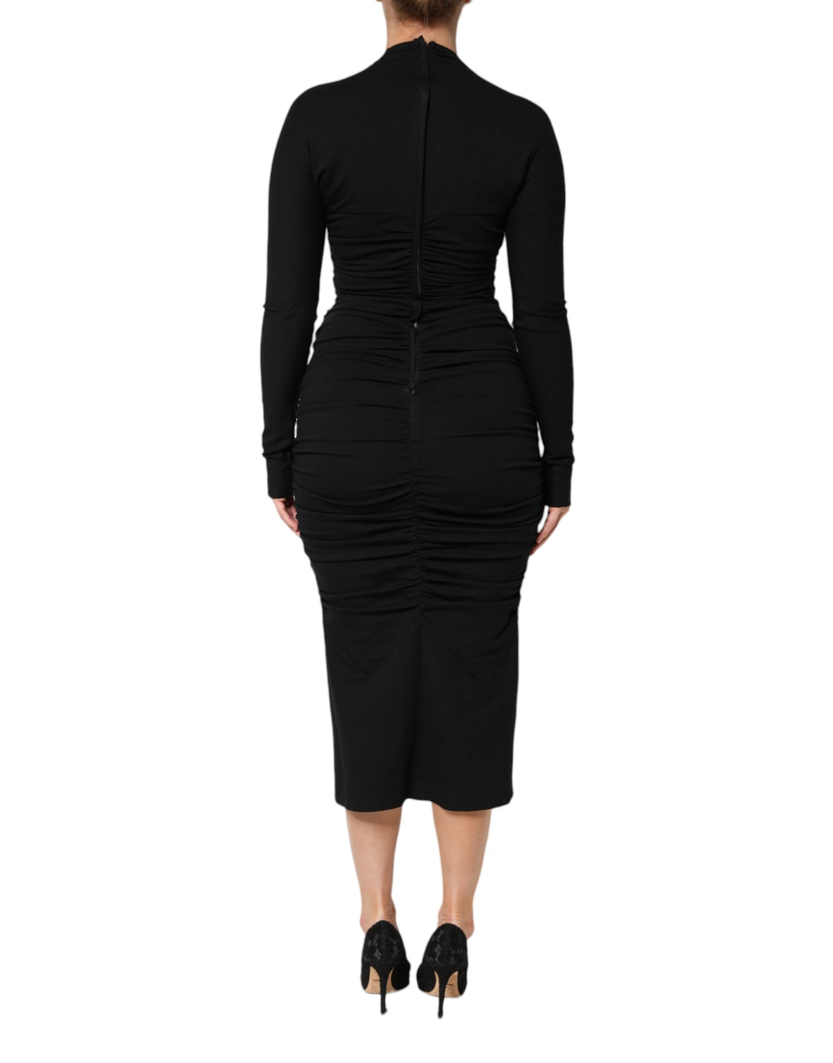 Indulge in the exquisite allure of the Dolce & Gabbana Black Long Sleeves Sheath Midi Dress, crafted from luxurious materials for a sophisticated statement in any setting.
