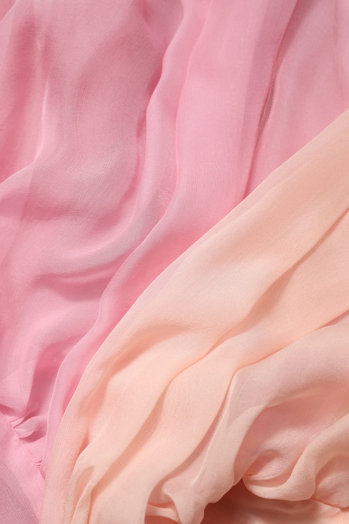 Indulge in the exquisite allure of the Dolce & Gabbana Pink Plunging V-neck Long Sleeves Blouse Top, a luxurious silk masterpiece that embodies timeless elegance and Italian craftsmanship.