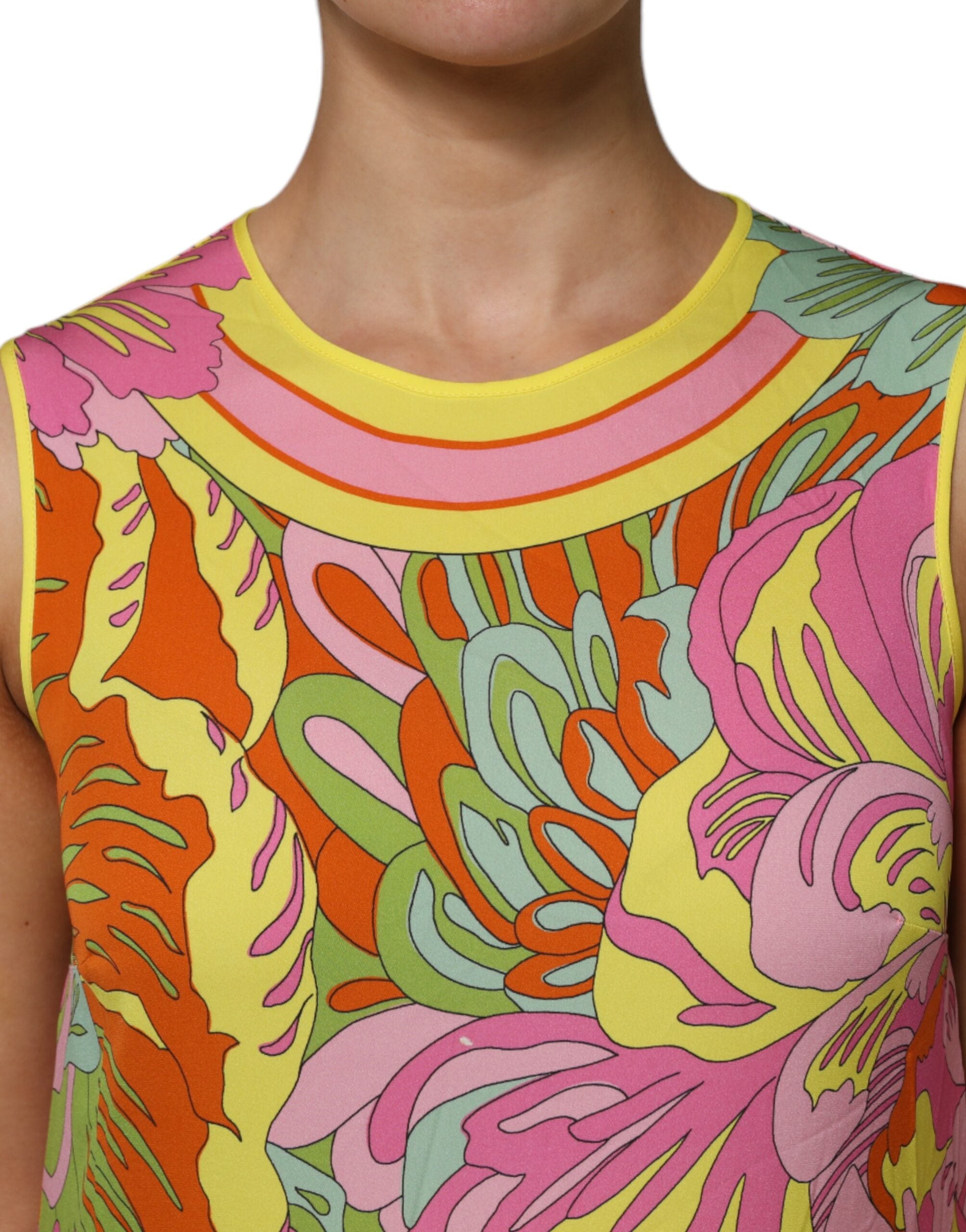 Discover the Dolce & Gabbana Multicolor Floral Roundneck Sleeveless Top, a silk masterpiece that embodies haute couture elegance and Italian artistry for the discerning fashion connoisseur.