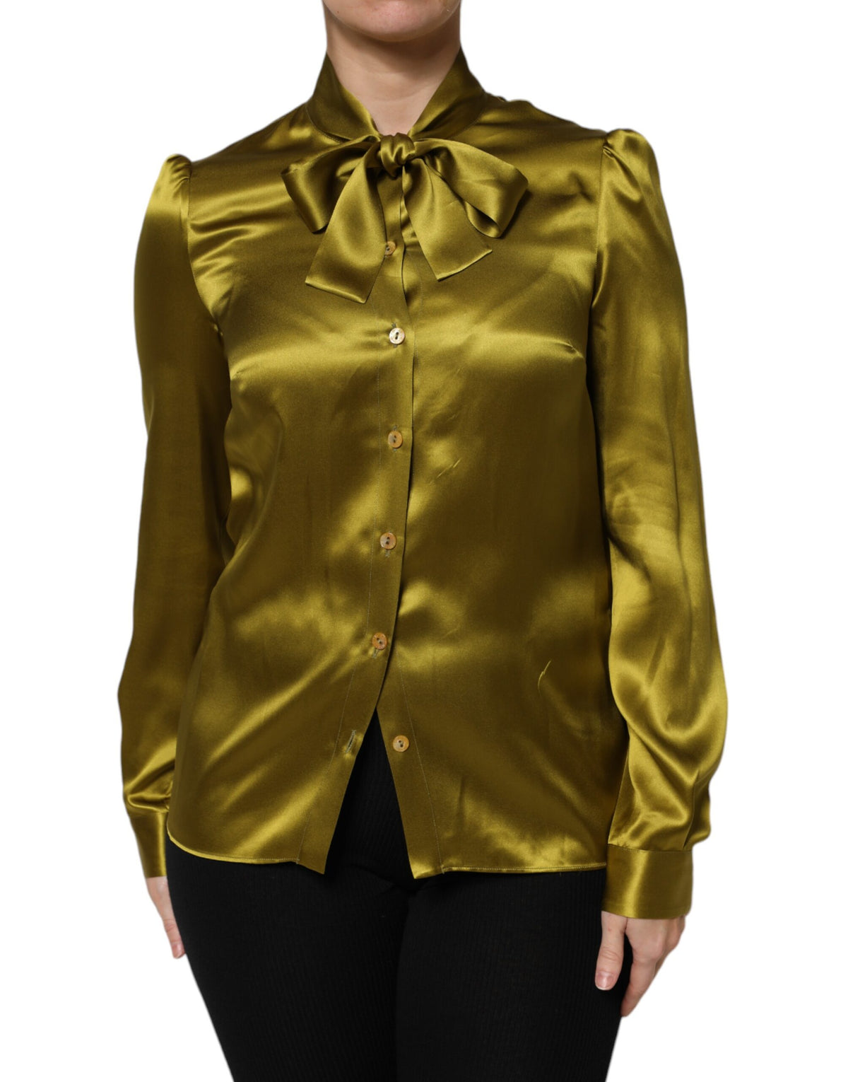 Indulge in the exquisite allure of Dolce & Gabbana's Green Ascot Collar Blouse, a luxurious silk masterpiece that embodies timeless elegance and sophisticated craftsmanship.