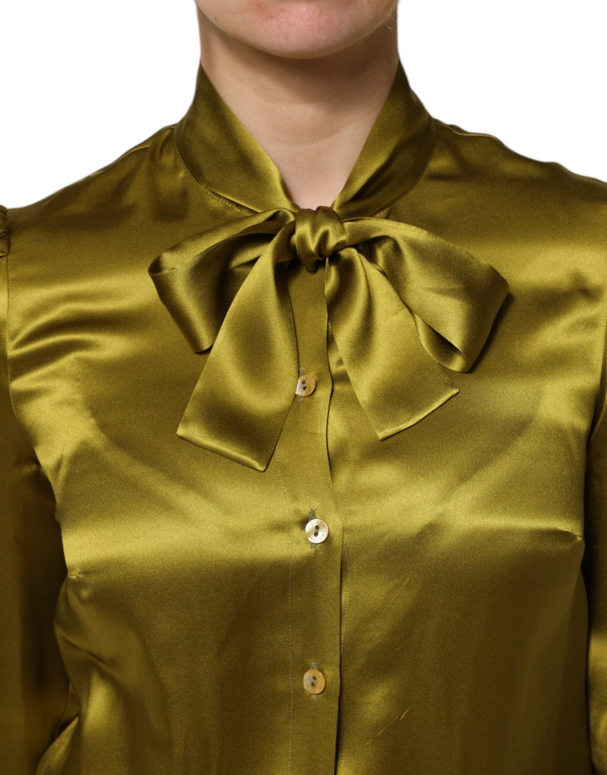 Elevate your wardrobe with the Dolce & Gabbana Green Ascot Collar Blouse Top, a luxurious silk masterpiece that embodies timeless elegance and exquisite craftsmanship.