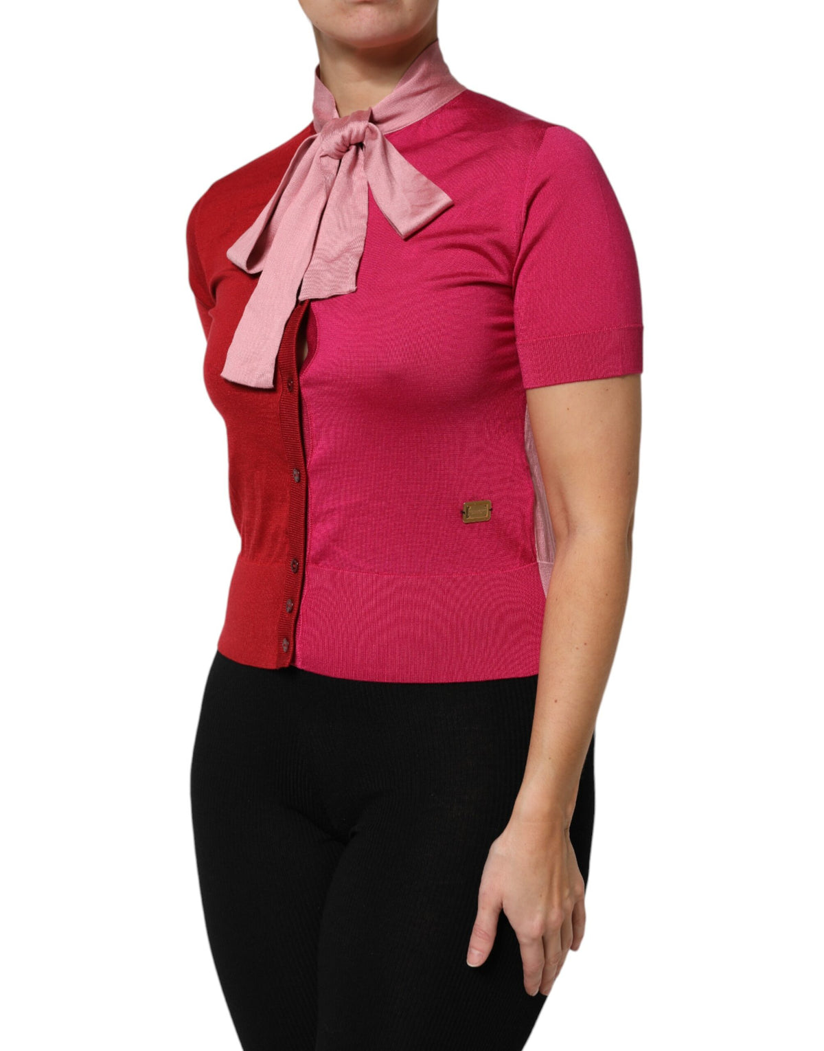 Indulge in the exquisite Dolce & Gabbana Pink Short Sleeves Buttoned Ascot Collar Top, a luxurious silk masterpiece that embodies timeless elegance and artisanal craftsmanship.