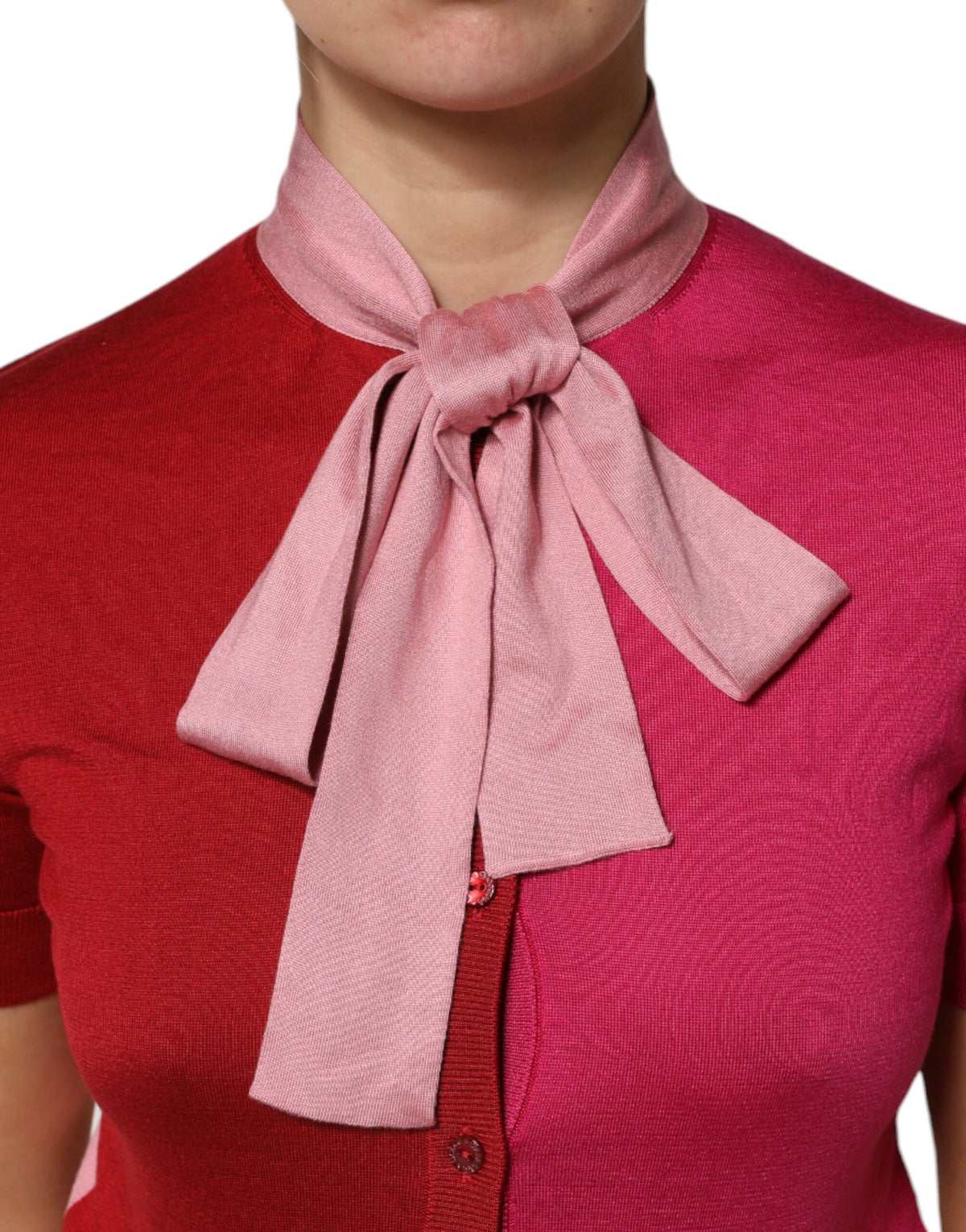 Elevate your elegance with the Dolce & Gabbana Pink Short Sleeves Buttoned Ascot Collar Top, a silk masterpiece that embodies artisanal luxury and timeless sophistication.