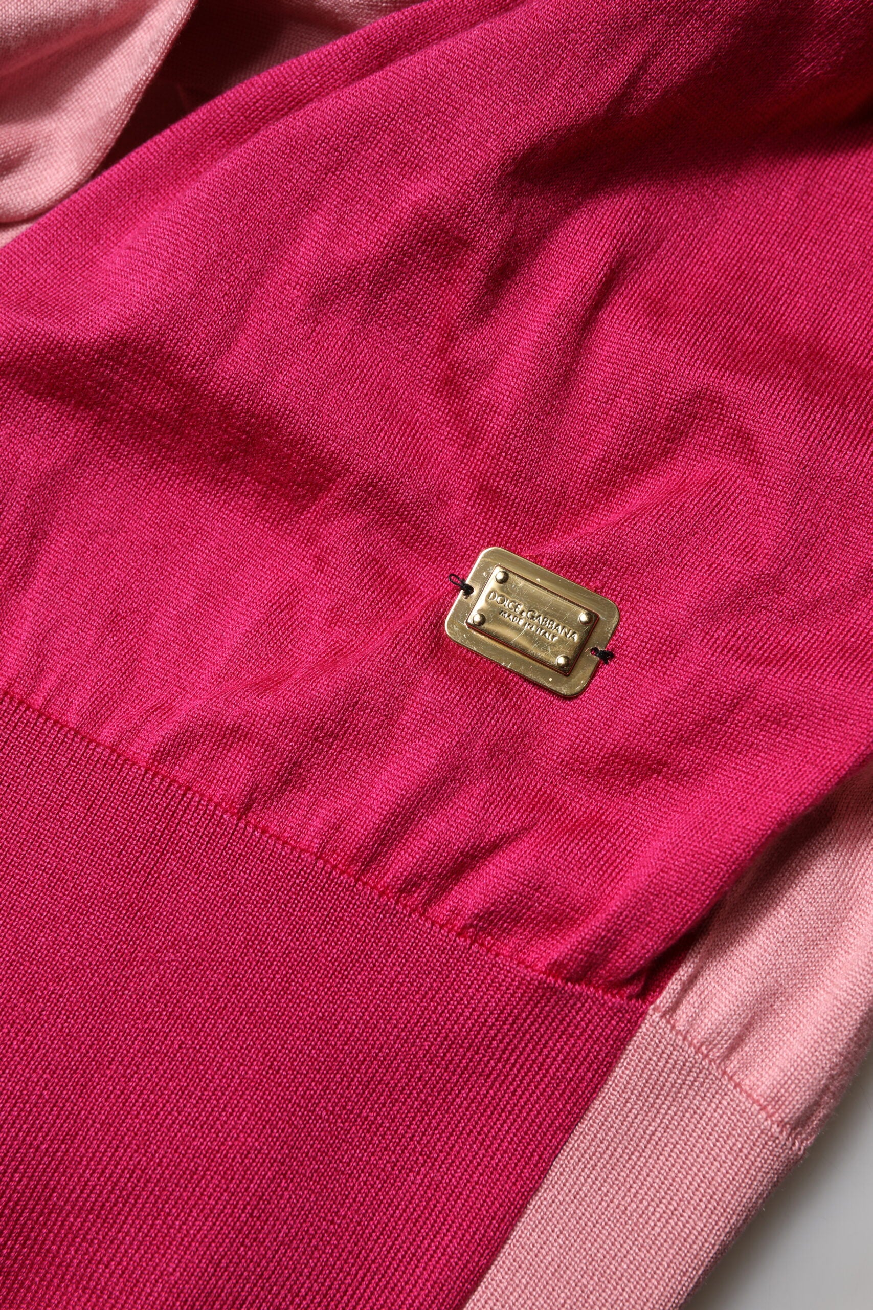 Indulge in the exquisite Dolce & Gabbana Pink Short Sleeves Buttoned Ascot Collar Top, a silk masterpiece that embodies timeless elegance and artisanal craftsmanship.