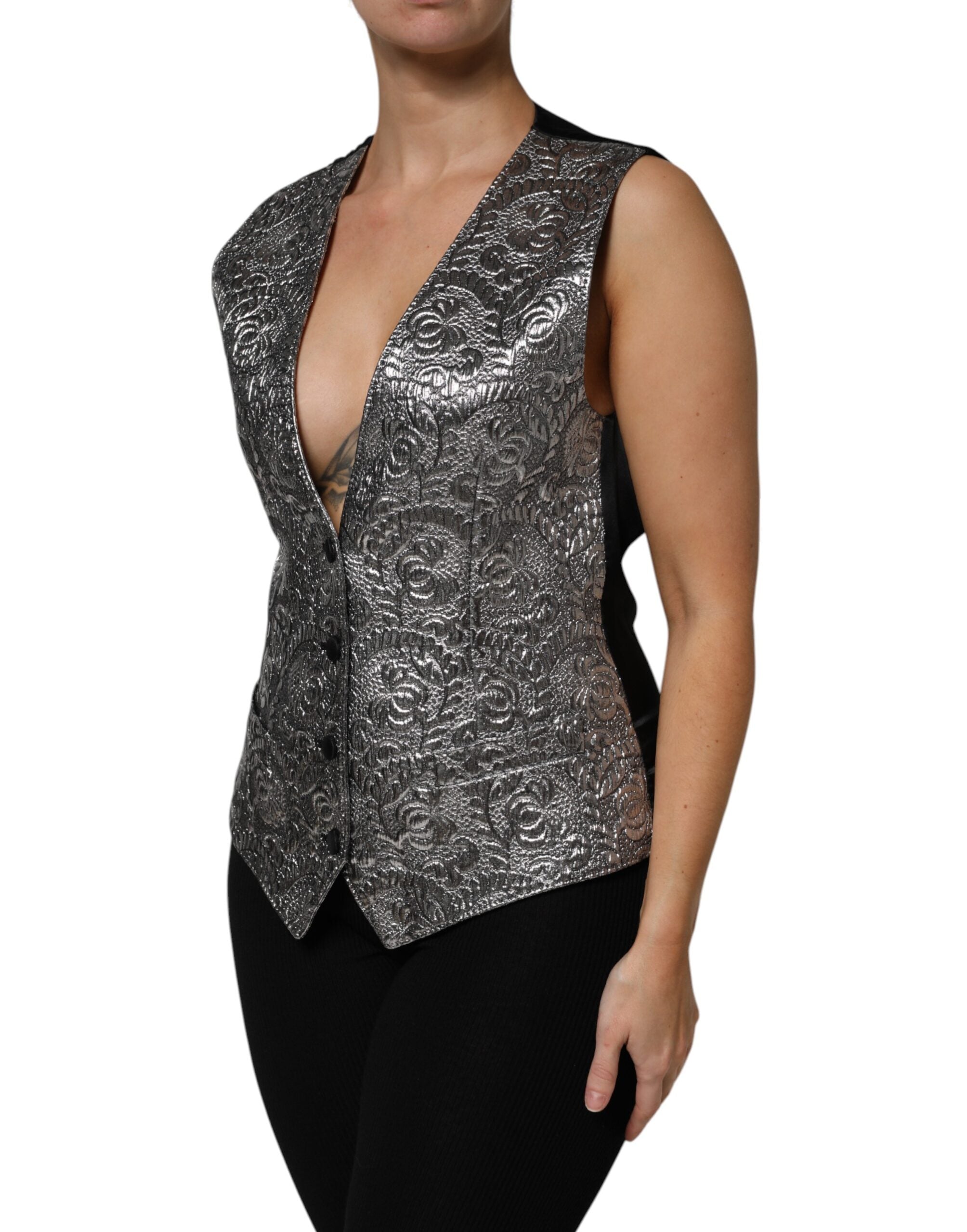 Elevate your wardrobe with the Dolce & Gabbana Silver Floral Jacquard Sleeveless Vest Top, a masterpiece of Italian craftsmanship that embodies timeless elegance and sophisticated allure.