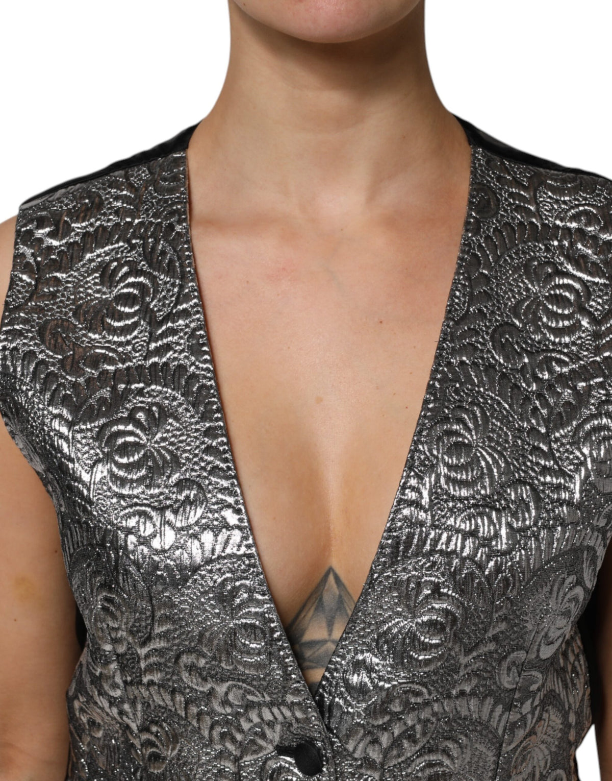 Experience the allure of Dolce & Gabbana's Silver Floral Jacquard Sleeveless Vest Top, crafted in Italy with luxurious silk and intricate patterns for timeless elegance.