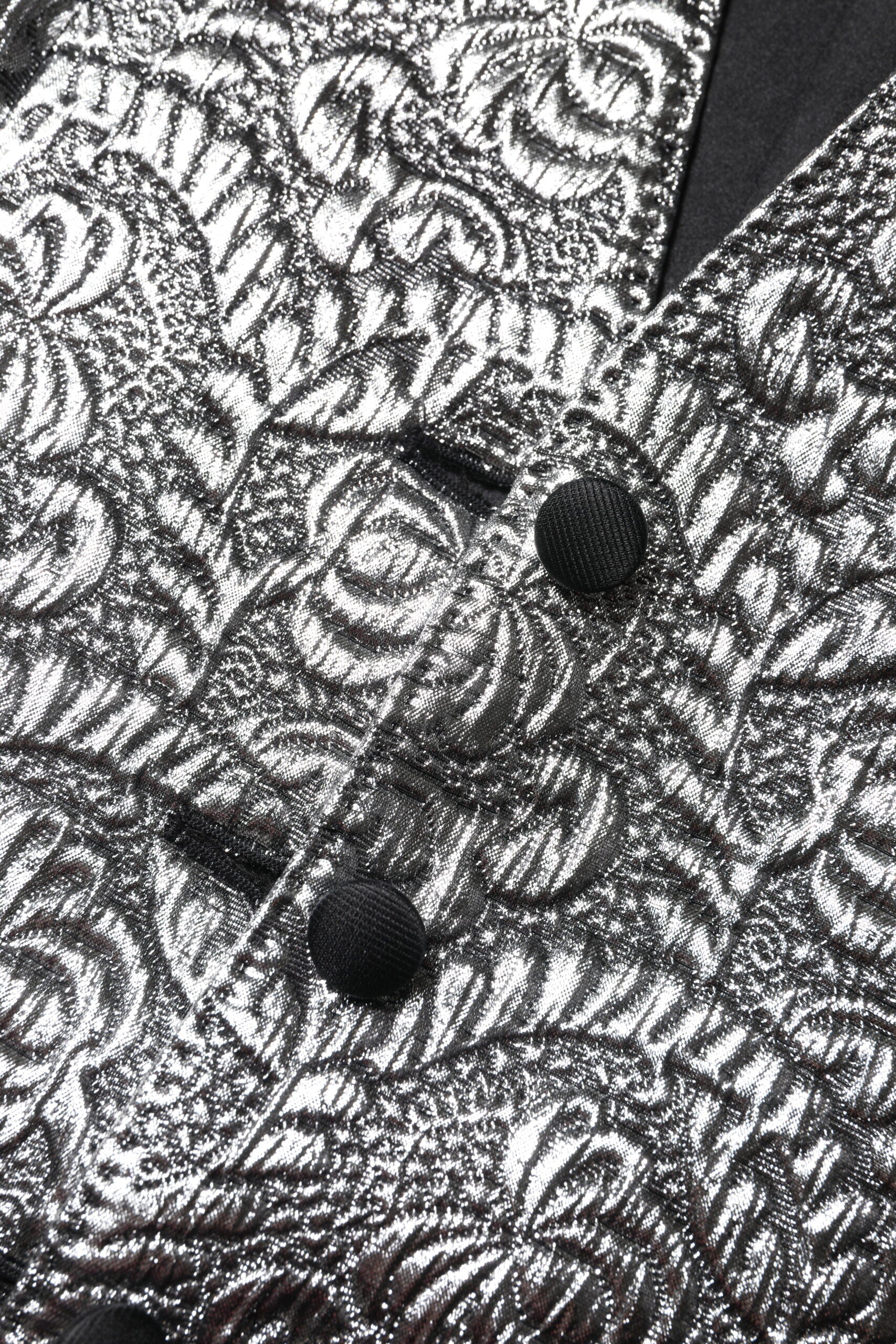 Indulge in the allure of Dolce & Gabbana's Silver Floral Jacquard Sleeveless Vest Top, crafted in Italy with luxurious silk and intricate patterns for timeless elegance.