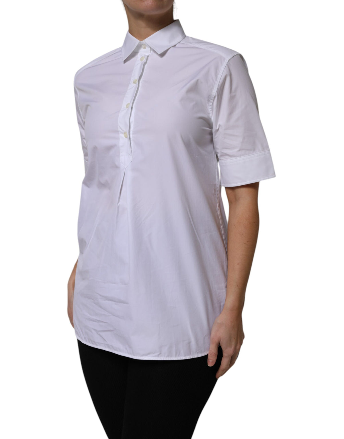 Elevate your wardrobe with the Dolce & Gabbana White Cotton Short Sleeves Collared Polo Top, a masterpiece of Italian craftsmanship that embodies timeless sophistication and luxury.