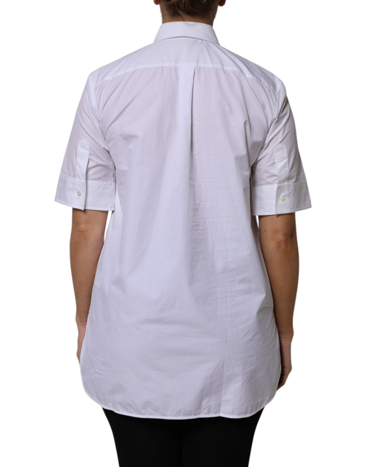 Elevate your wardrobe with the Dolce & Gabbana White Cotton Short Sleeves Collared Polo Top, a masterpiece of Italian craftsmanship that embodies timeless elegance and sophisticated allure.