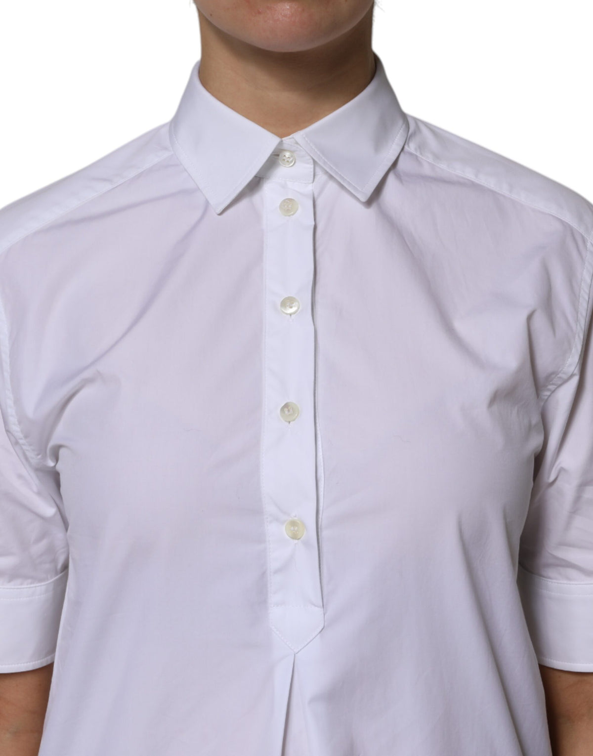 Indulge in the exquisite Dolce & Gabbana White Cotton Short Sleeves Collared Polo Top, where Italian craftsmanship meets timeless elegance for the discerning individual.