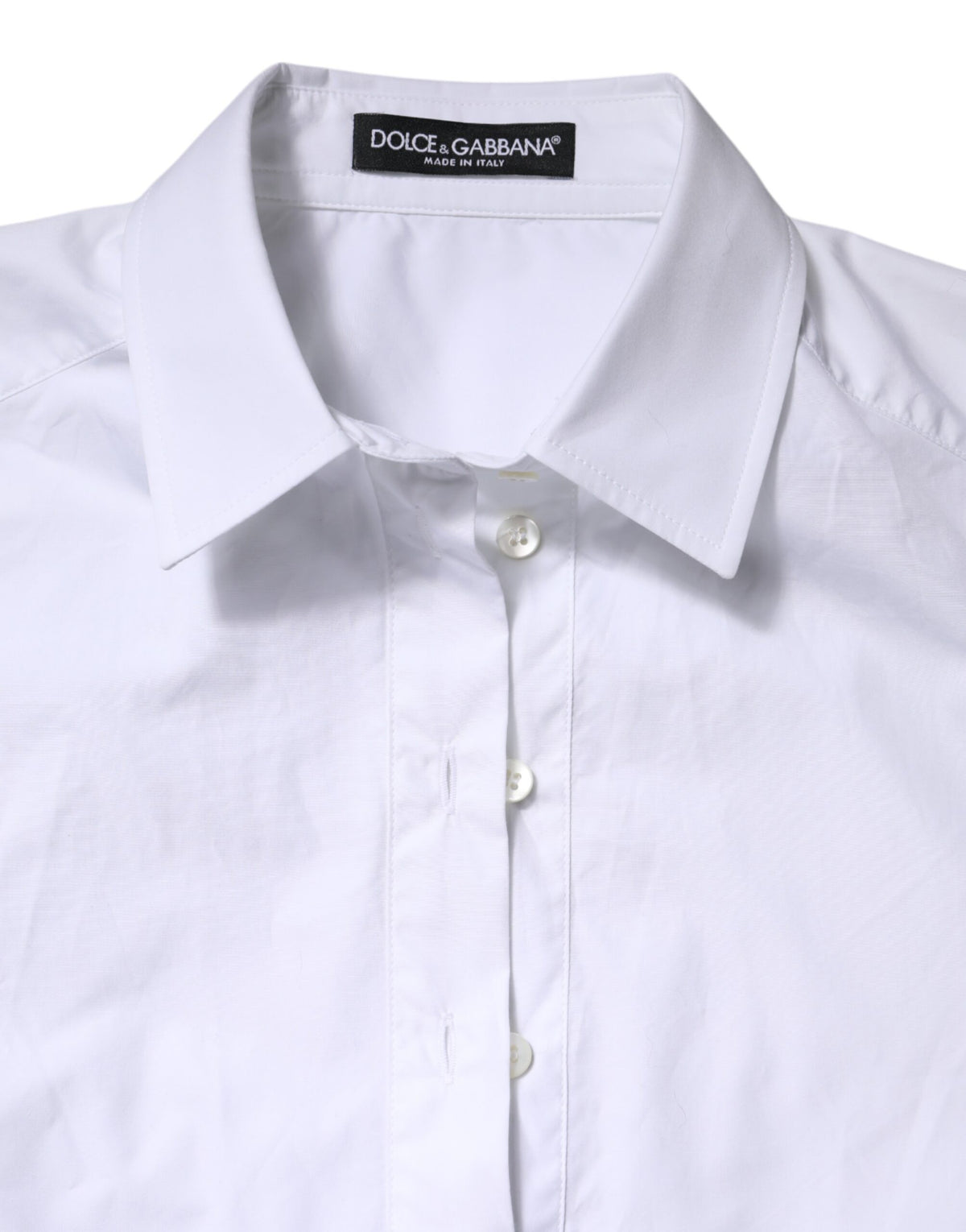 Elevate your wardrobe with the Dolce & Gabbana White Cotton Short Sleeves Collared Polo Top, a masterpiece of Italian craftsmanship that embodies timeless elegance and sophistication.