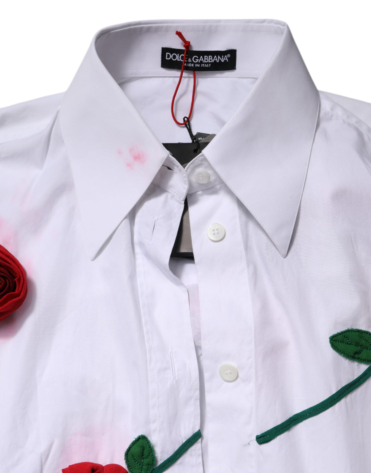 Elevate your wardrobe with the Dolce & Gabbana White Cotton Floral Appliques Dress Shirt Top, a masterpiece of Italian craftsmanship that embodies timeless elegance and sophistication.