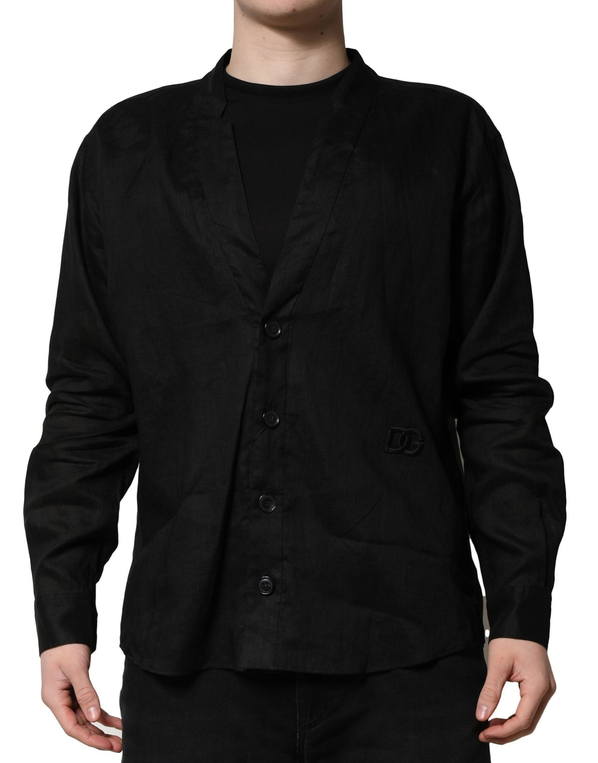 Indulge in the exquisite craftsmanship of the Dolce & Gabbana Black Linen Long Sleeves Casual Shirt, a timeless piece that embodies luxury and sophistication for the discerning individual.