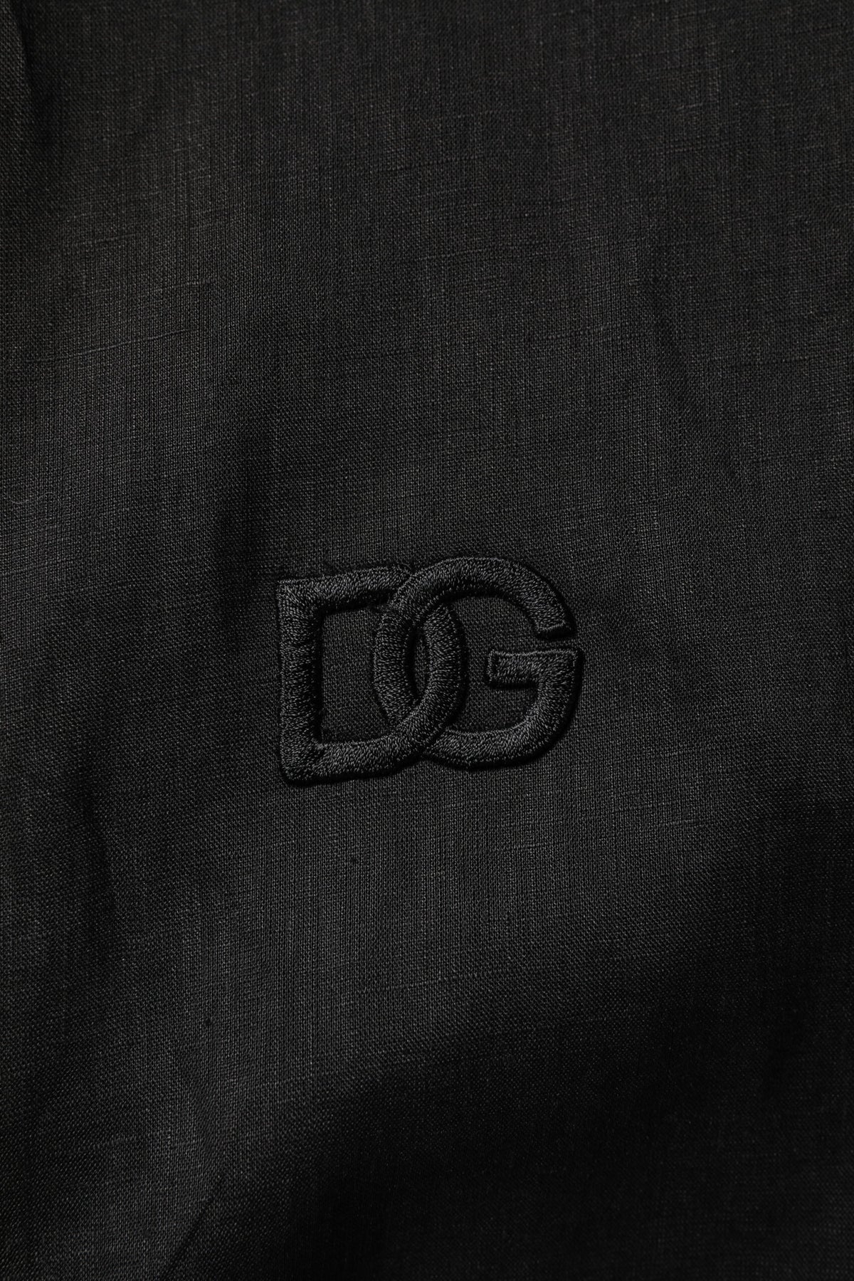 Indulge in the exquisite Dolce & Gabbana Black Linen Long Sleeves Casual Shirt, a timeless piece crafted from pure linen, embodying Italian luxury and sophistication.