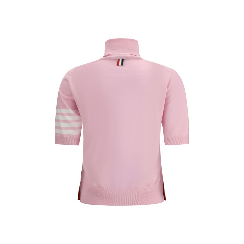 Experience the sublime elegance of the Thom Browne Multicolor Polyamide Turtleneck, a luxurious blend of 1% Polyamide and 99% Fleece Wool, redefining sophistication for the discerning individual.
