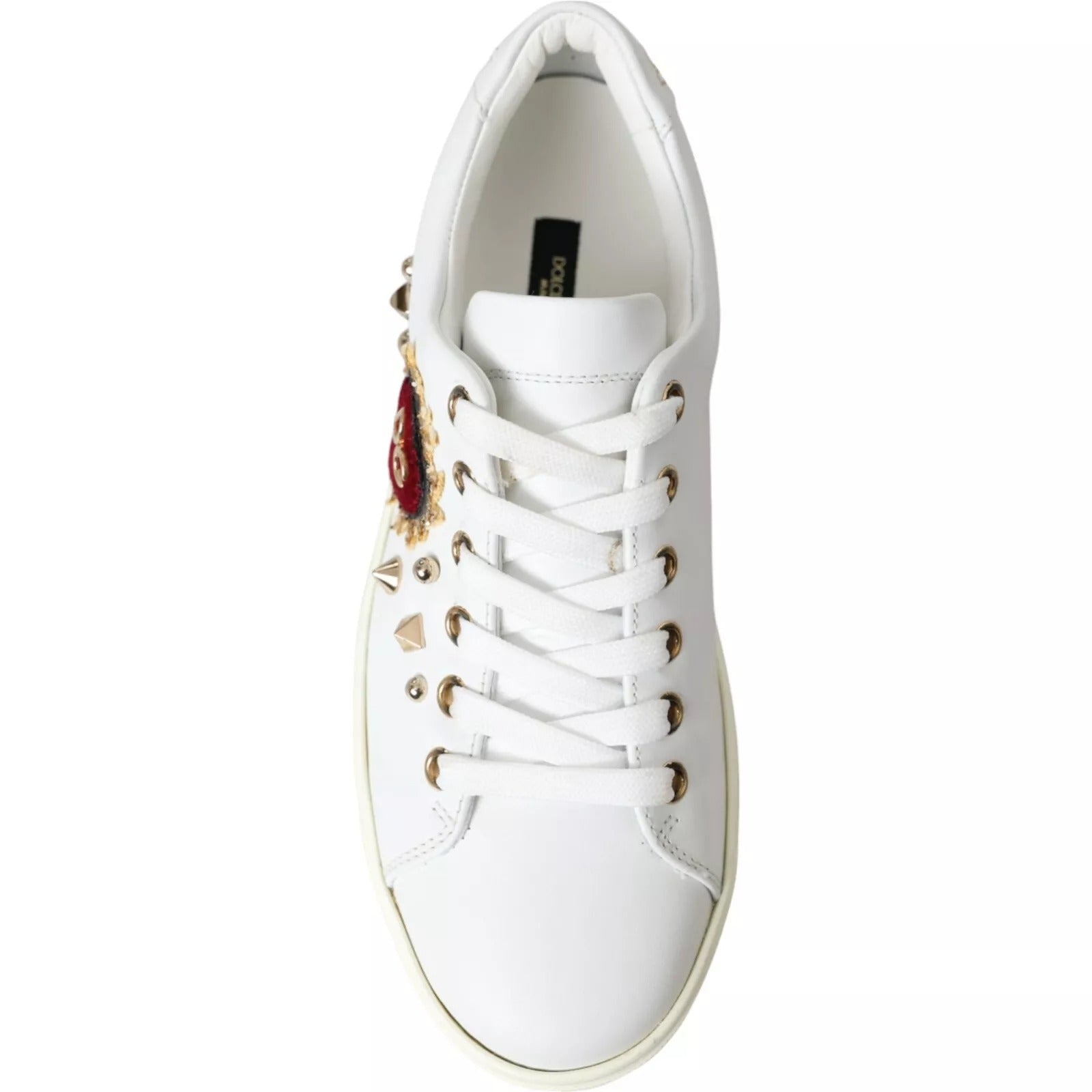 Indulge in the exquisite Dolce & Gabbana Portofino Sneakers, crafted from sumptuous calf leather, embodying elegance and artistry for the discerning individual.