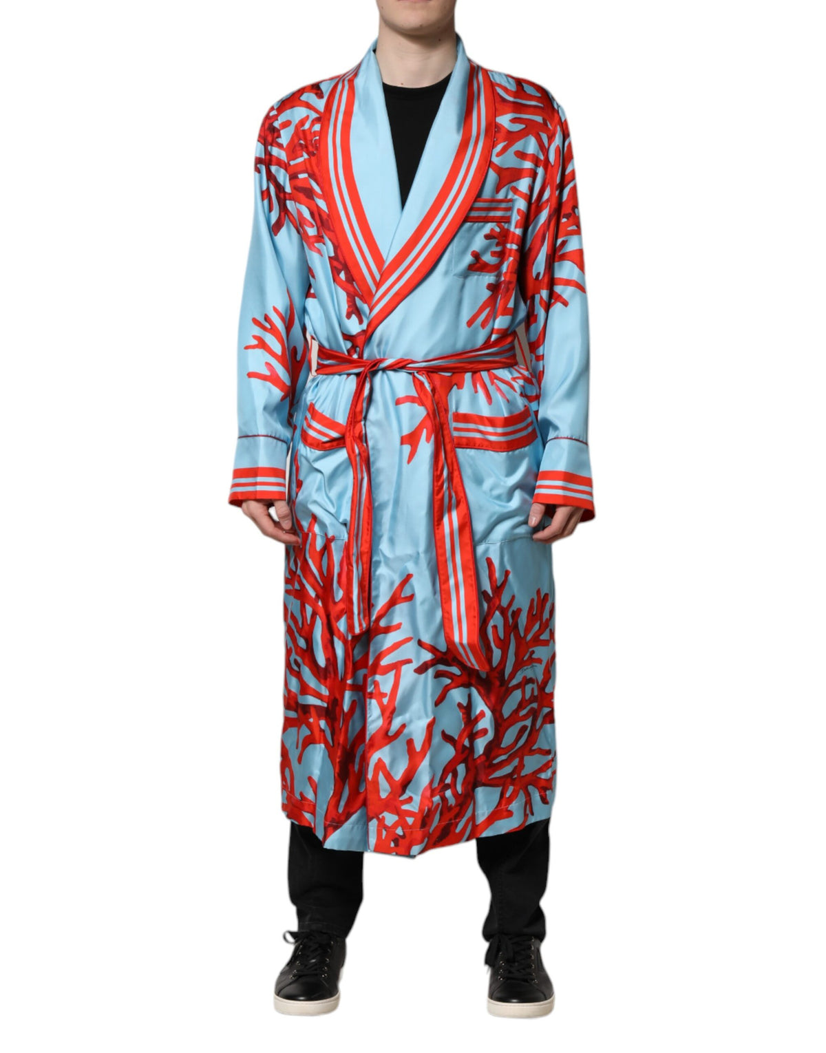 Experience the allure of Dolce & Gabbana's Blue Red Coral Print Wrap Robe Coat Jacket, a masterpiece of silk that embodies elegance and sophistication for the discerning individual.
