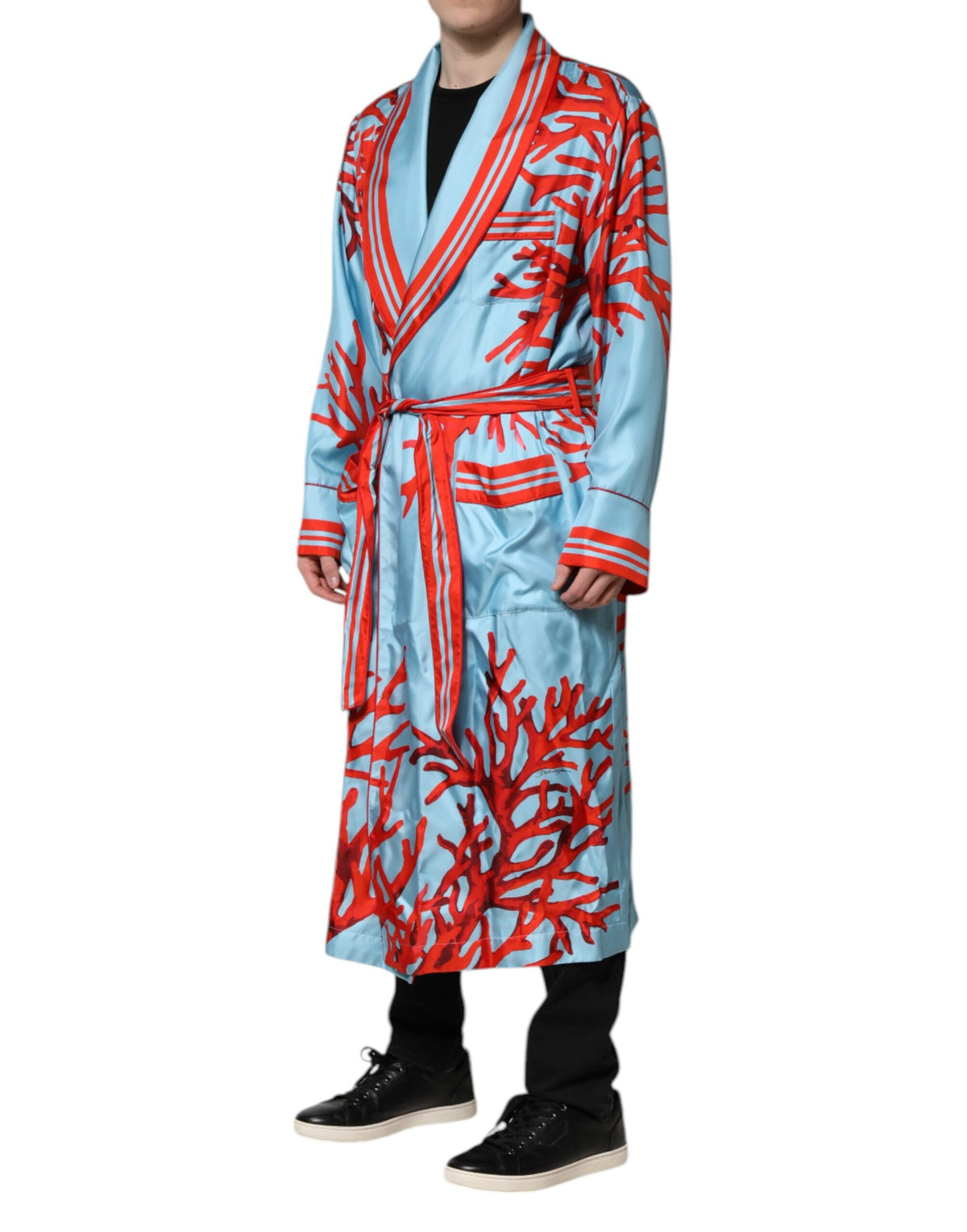 Elevate your wardrobe with the Dolce & Gabbana Blue Red Coral Print Wrap Robe Coat Jacket, a silk masterpiece that embodies timeless elegance and sophisticated allure.