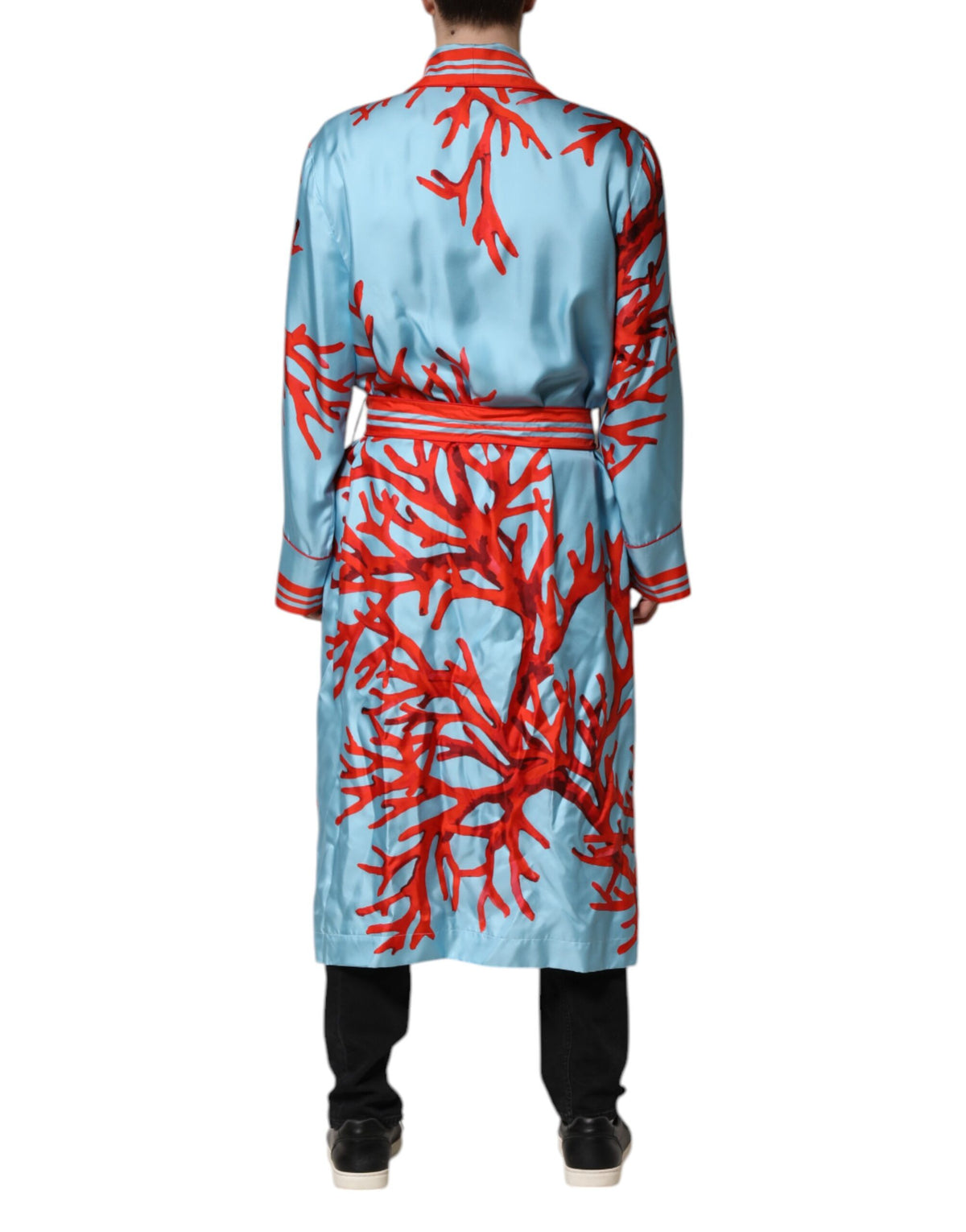 Indulge in the exquisite Dolce & Gabbana Blue Red Coral Print Wrap Robe Coat Jacket, a timeless silk masterpiece that embodies luxury and sophistication for the discerning individual.