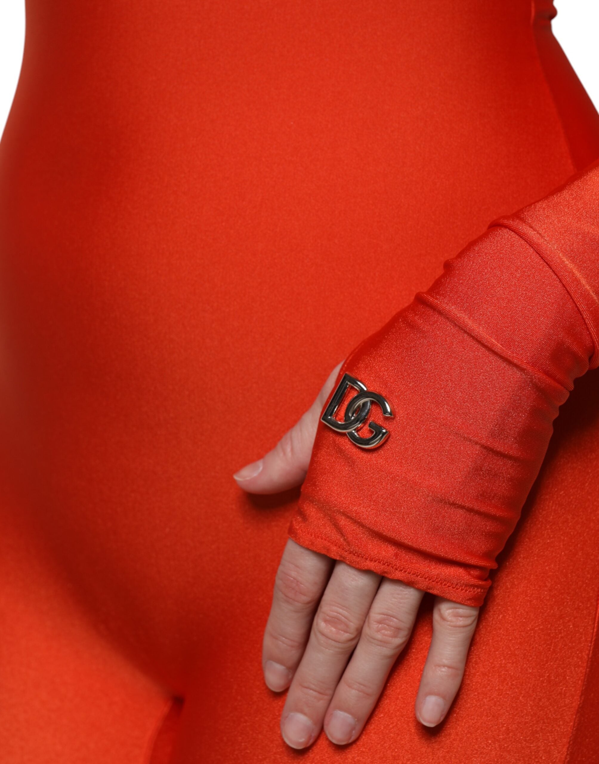 Indulge in the allure of the Dolce & Gabbana Red Nylon Turtleneck Bodycon Jumpsuit Dress, where exquisite Italian craftsmanship meets luxurious comfort for a captivating statement.