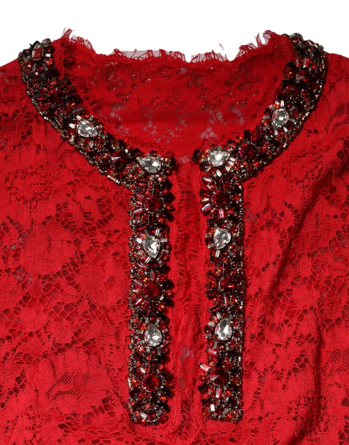 Indulge in the Dolce & Gabbana Red Floral Lace Rhinestone Embellished Dress, a masterpiece of Italian craftsmanship that embodies luxury and elegance for unforgettable evenings.