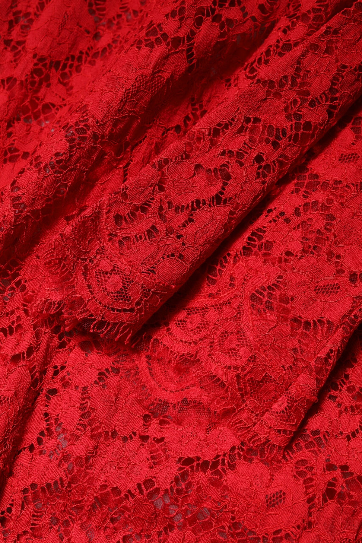 Indulge in the exquisite Dolce & Gabbana Red Floral Lace Rhinestone Embellished Dress, a masterpiece of Italian craftsmanship that embodies luxury and elegance for the discerning individual.