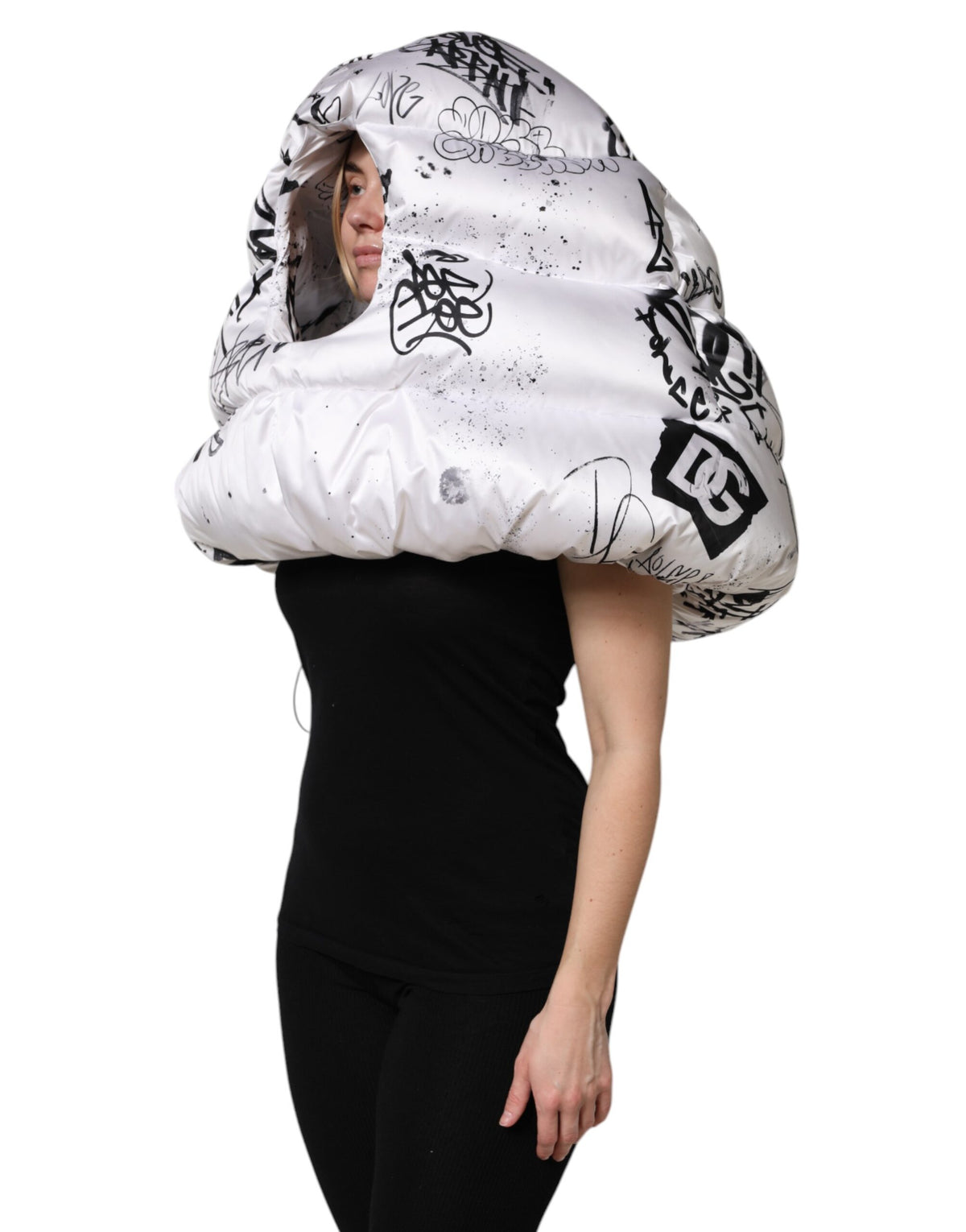 Discover the Dolce & Gabbana White Polyester Printed Hood Quilted Hat, a masterpiece of artisanal luxury that elevates your style with exquisite craftsmanship and timeless elegance.