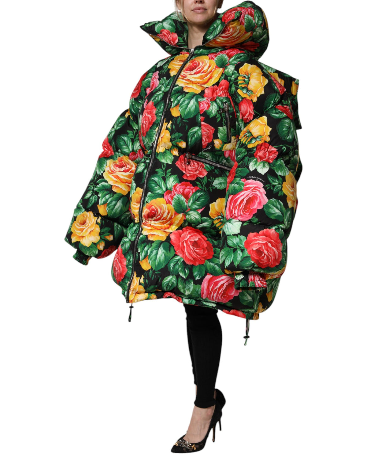 Experience the artistry of Dolce & Gabbana with the Multicolor Floral Puffer Hooded Jacket, a luxurious blend of comfort and elegance, perfect for any occasion.
