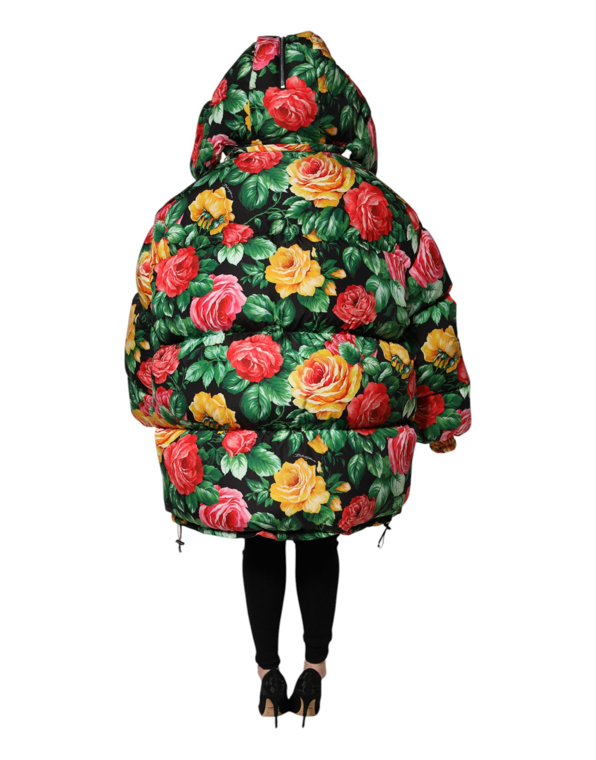 Indulge in the Dolce & Gabbana Multicolor Floral Puffer Hooded Jacket, a masterpiece of Italian craftsmanship, blending luxurious comfort with vibrant elegance for every occasion.