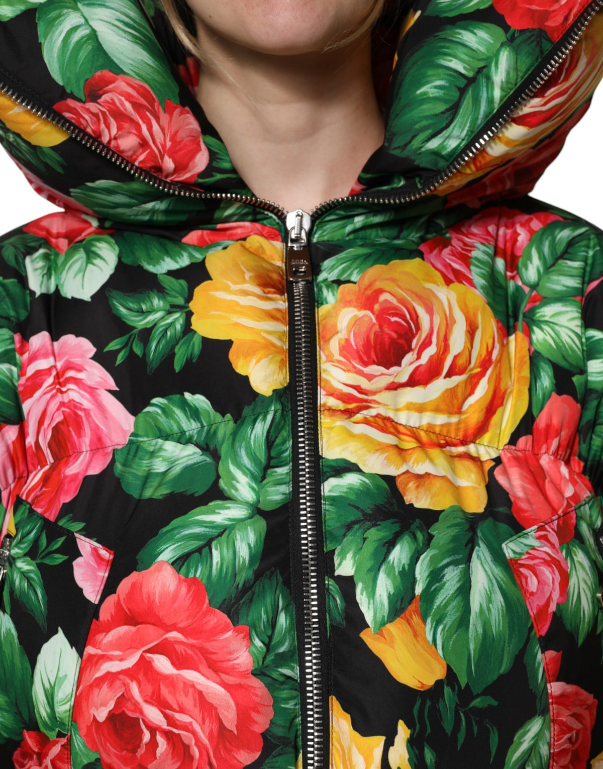 Elevate your style with the Dolce & Gabbana Multicolor Floral Puffer Hooded Jacket, a masterpiece of Italian craftsmanship in luxurious polyester, perfect for any occasion.
