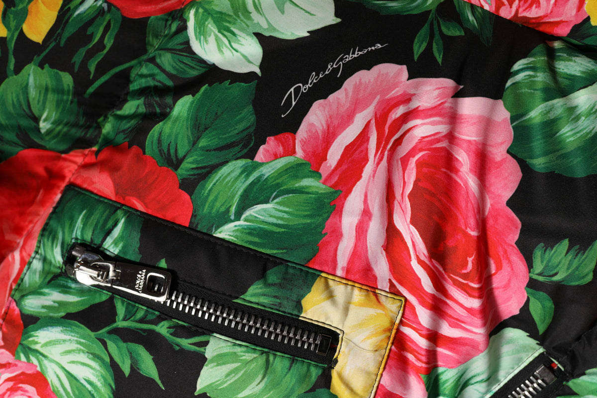 Indulge in the Dolce & Gabbana Multicolor Floral Puffer Hooded Jacket, a masterpiece of Italian craftsmanship that embodies luxurious comfort and timeless elegance.