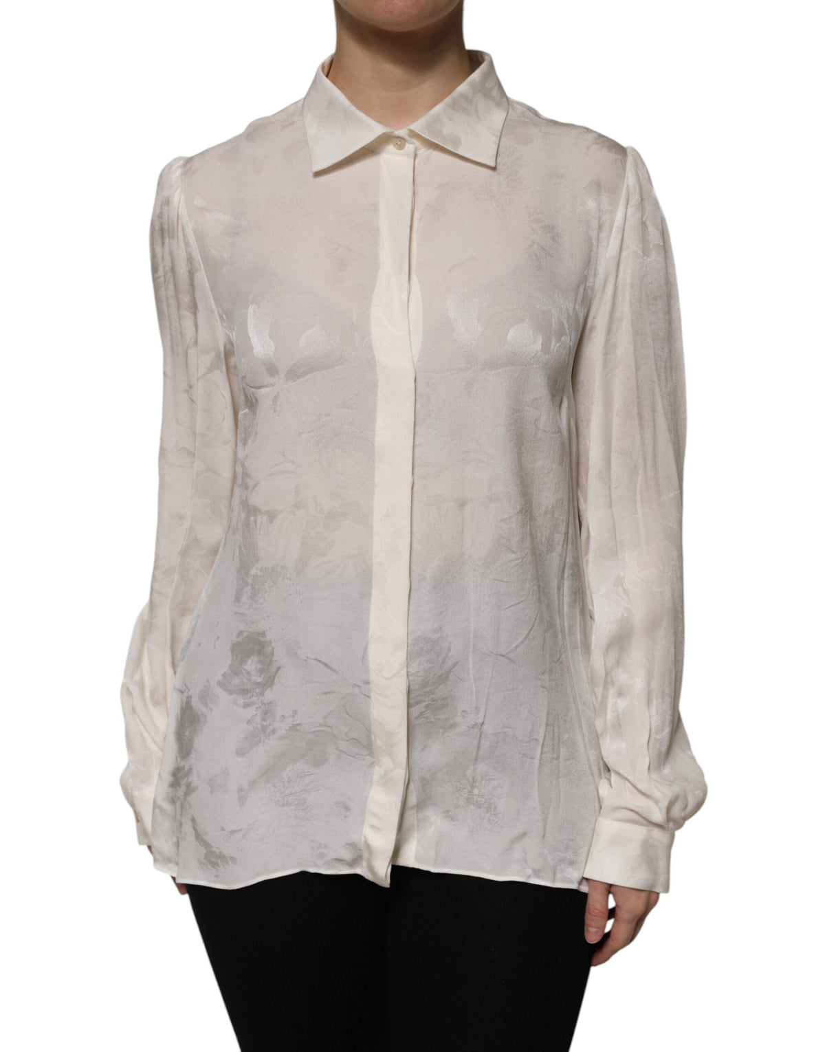 Experience the epitome of elegance with the Dolce & Gabbana White Button Down Long Sleeves Blouse, a silk masterpiece that redefines luxury and sophistication.