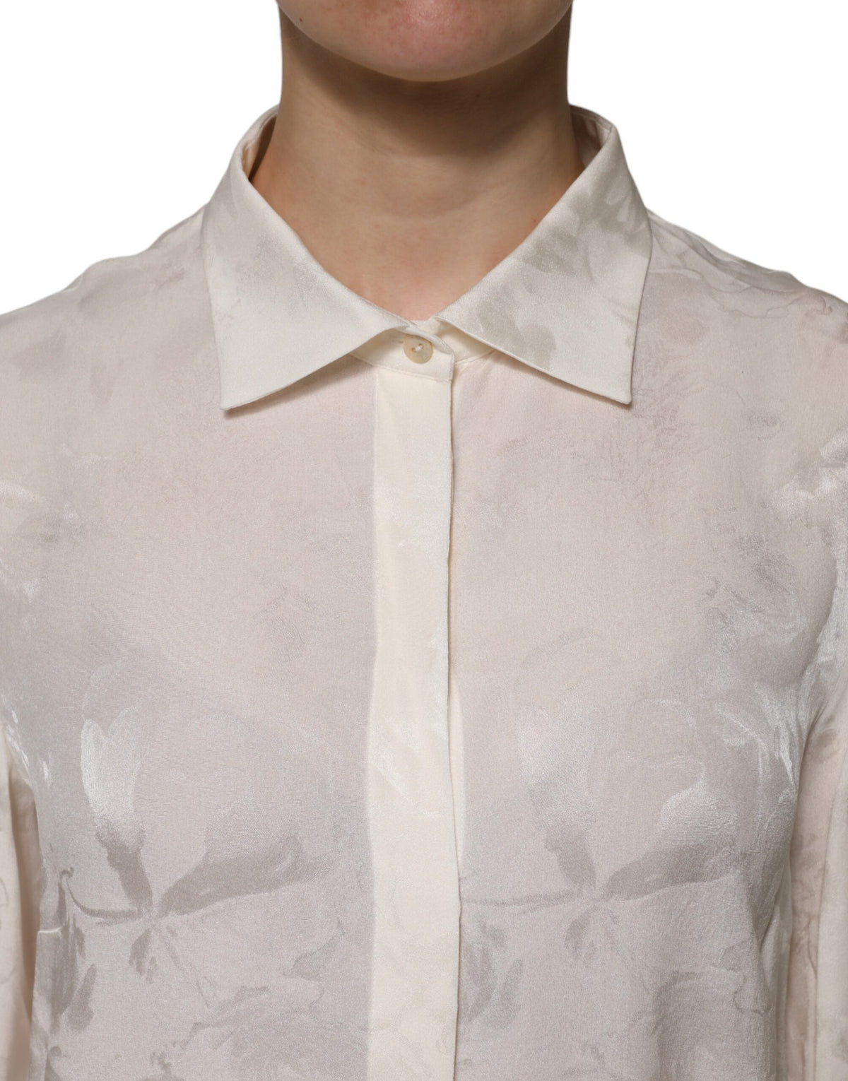 Indulge in the exquisite Dolce & Gabbana White Button Down Long Sleeves Blouse Top, a silk masterpiece that embodies timeless elegance and luxurious sophistication.