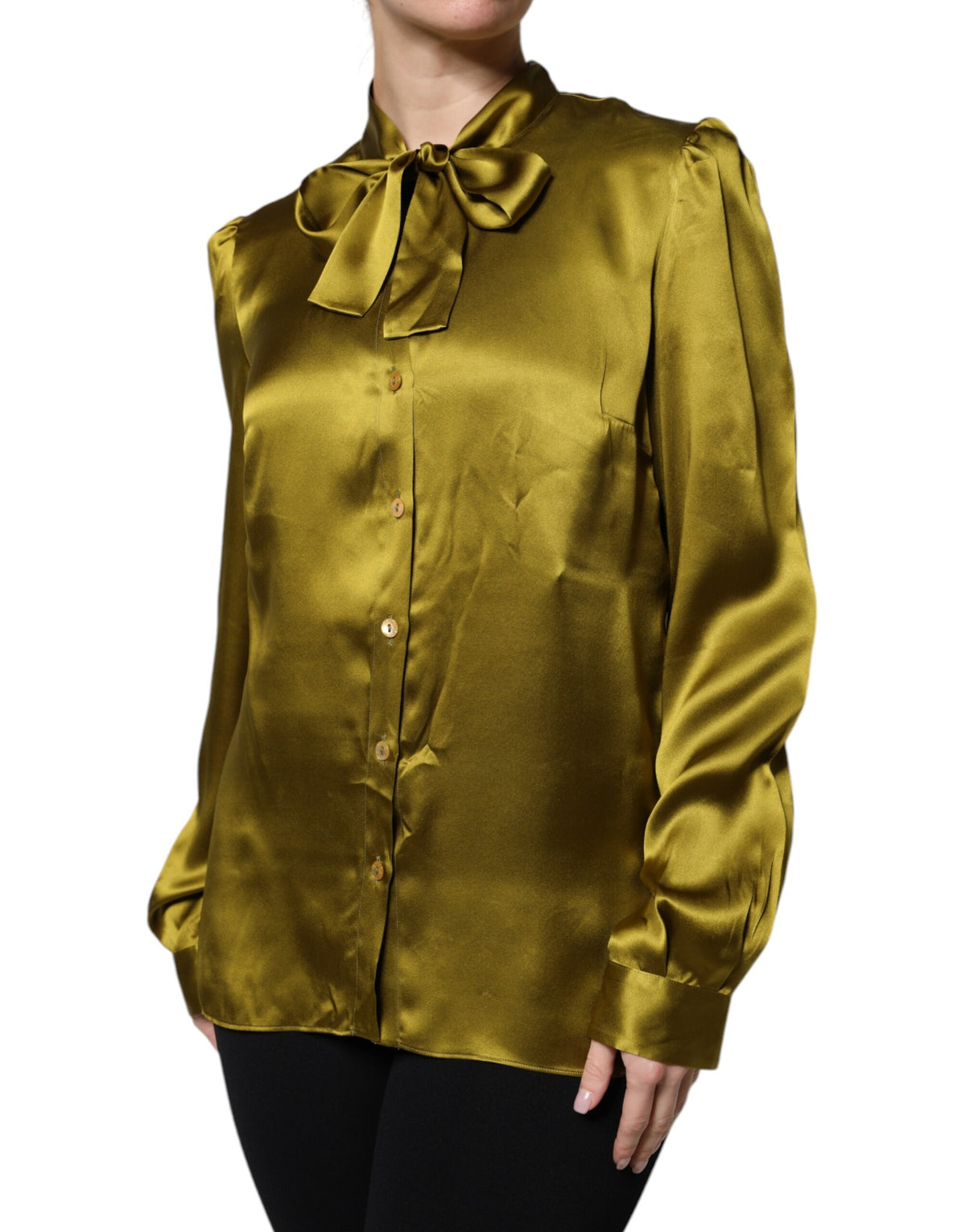 Elevate your wardrobe with the Dolce & Gabbana Green Ascot Collar Silk Blouse, a timeless piece crafted from luxurious silk, embodying Italian sophistication and allure.